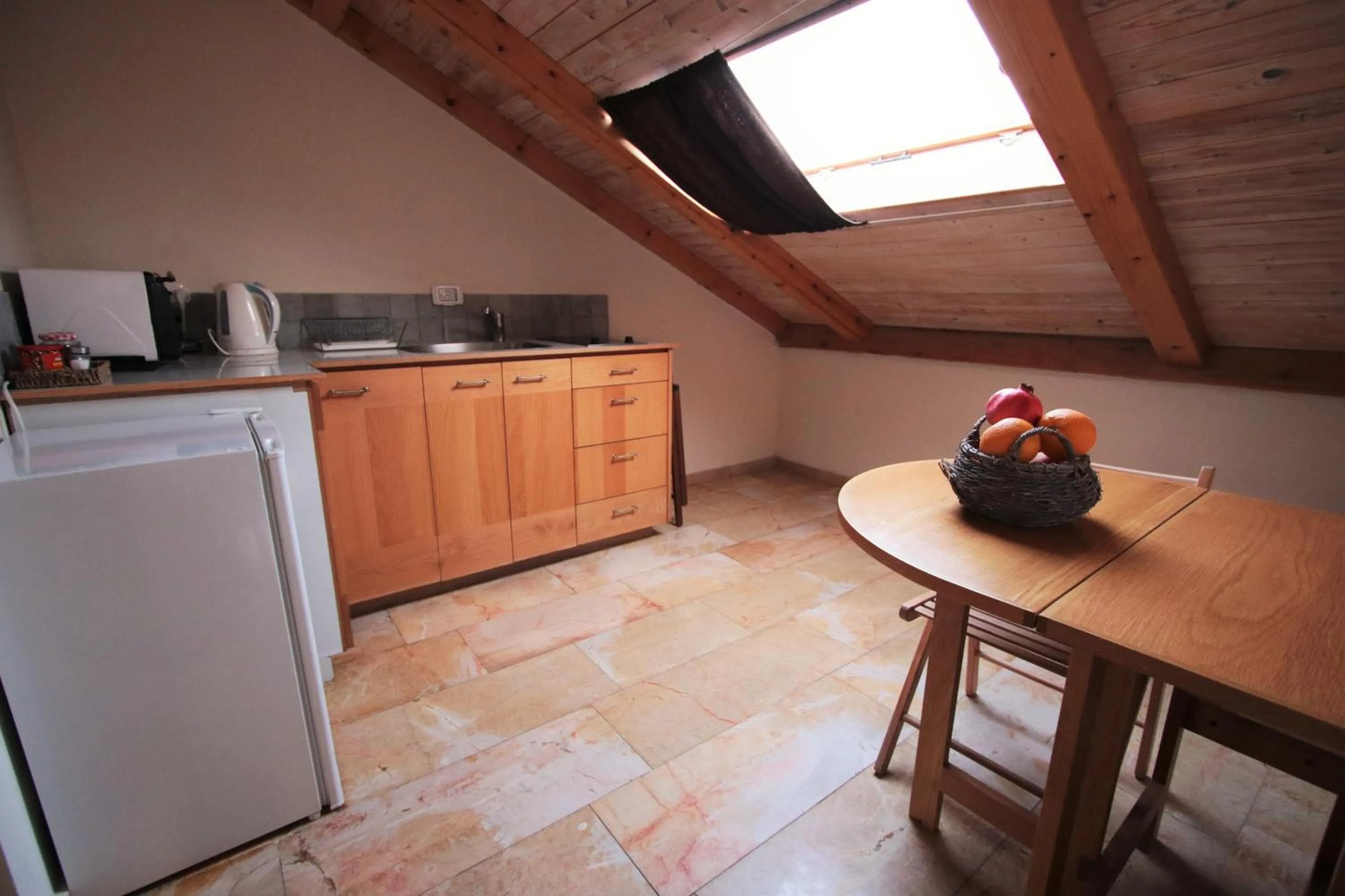 Kitchen or kitchenette in The Market Courtyard - Suites Hotel