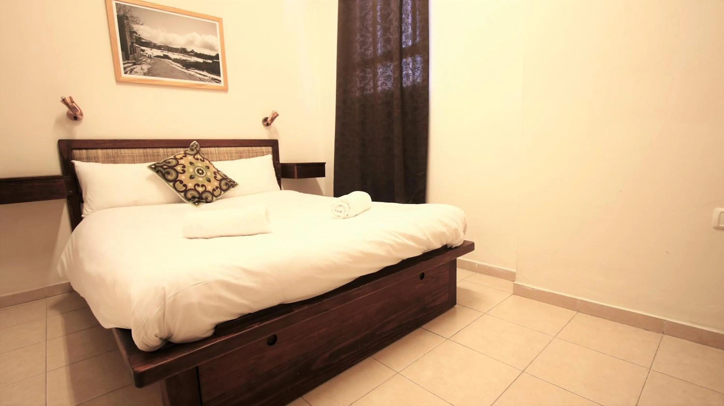 Photo of the whole room, Bed in The Market Courtyard - Suites Hotel