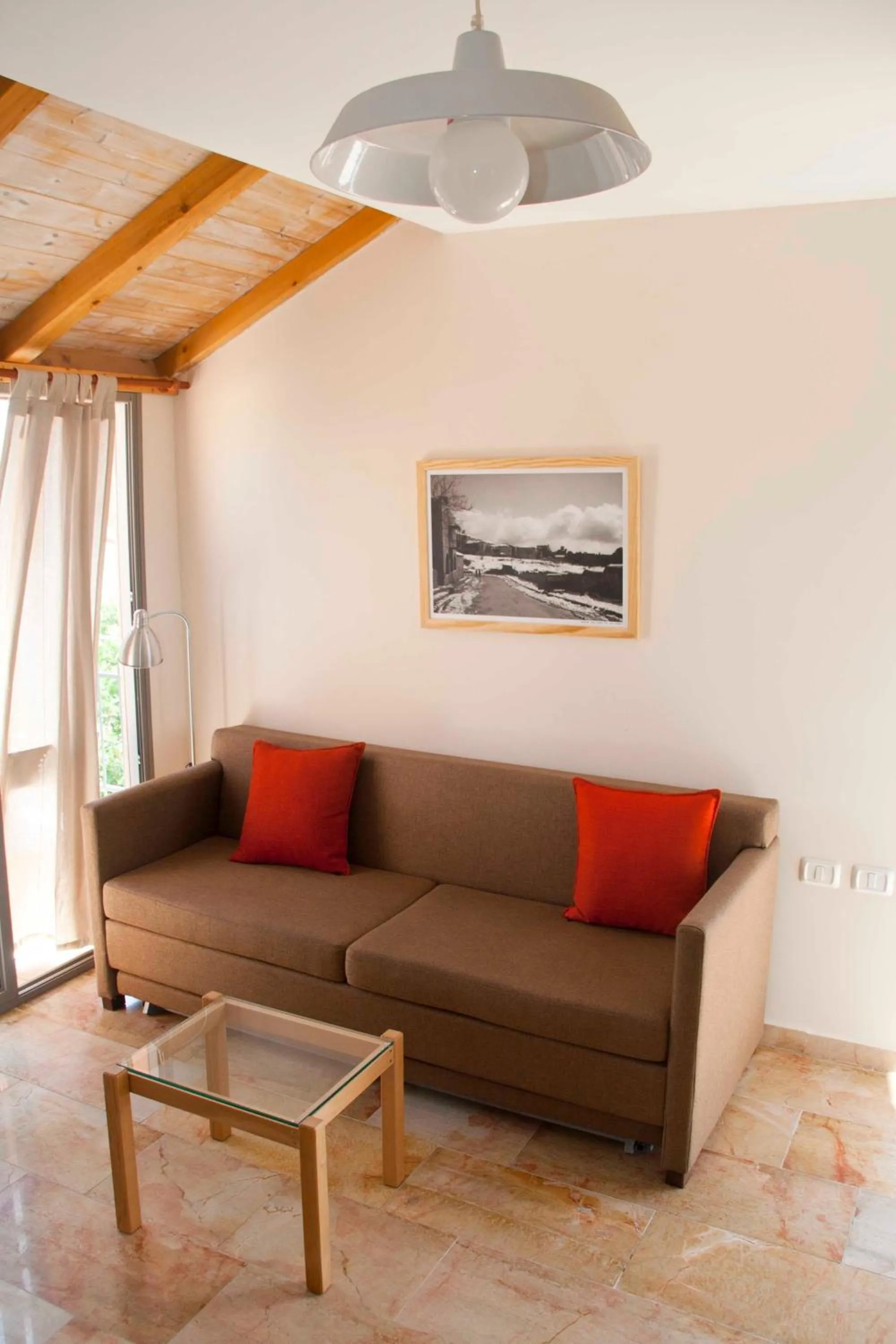 Seating area in The Market Courtyard - Suites Hotel