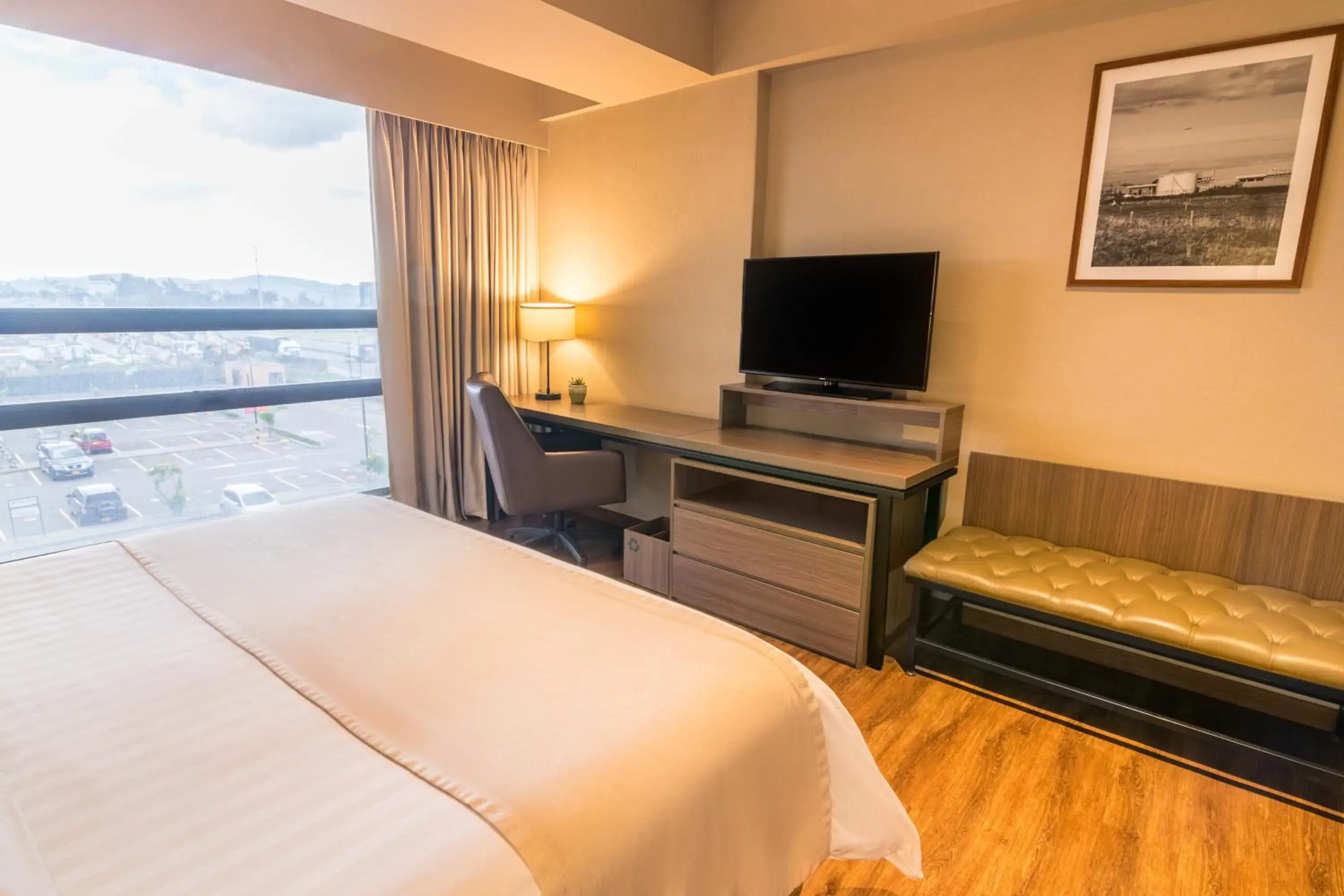 Communal lounge/ TV room, Bed in GHL Hotel Bogota Occidente Communal lounge/ TV room, Bed in GHL Hotel Bogota Occidente