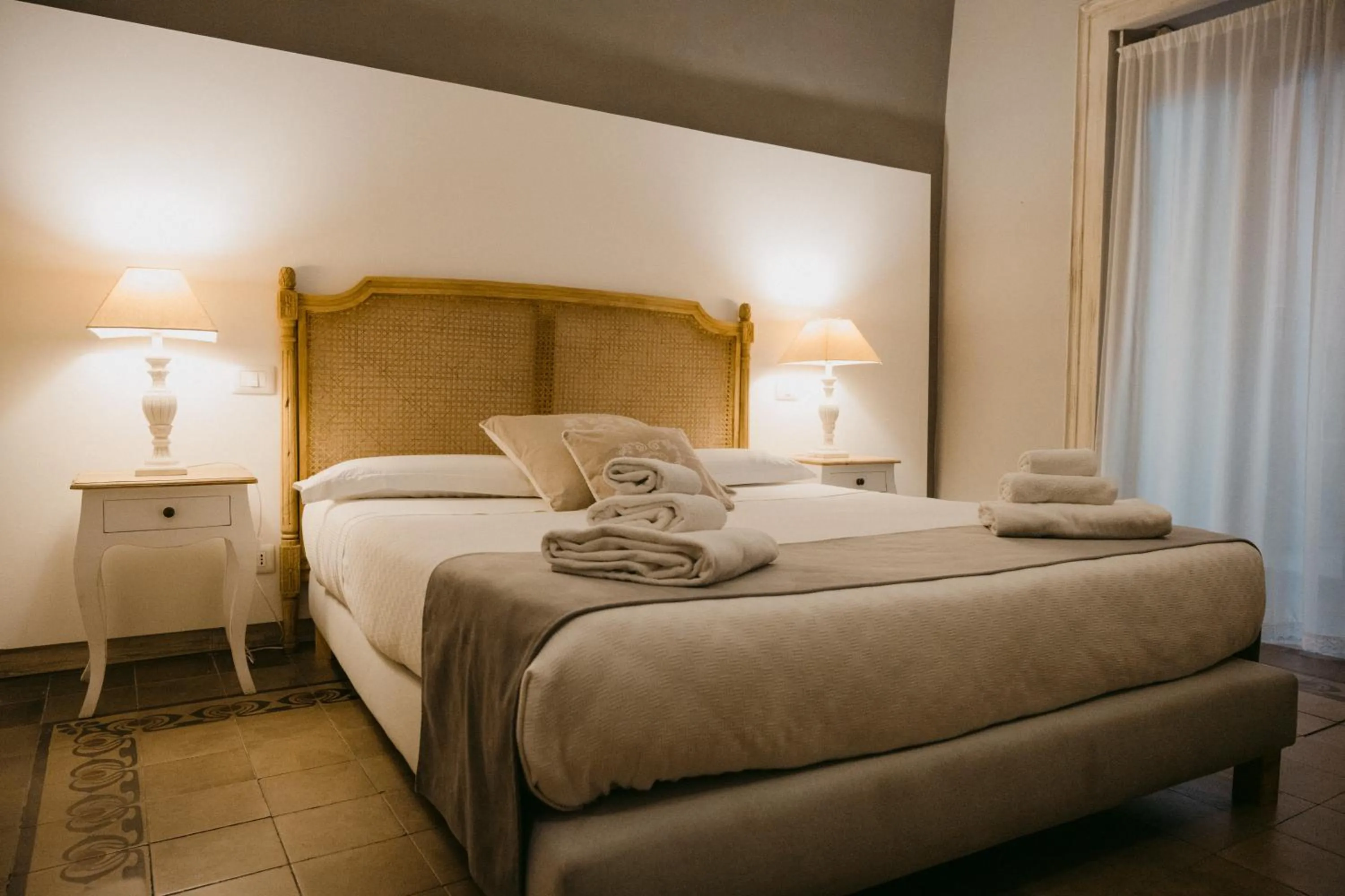 Bed in La Casa di Alma Luxury rooms