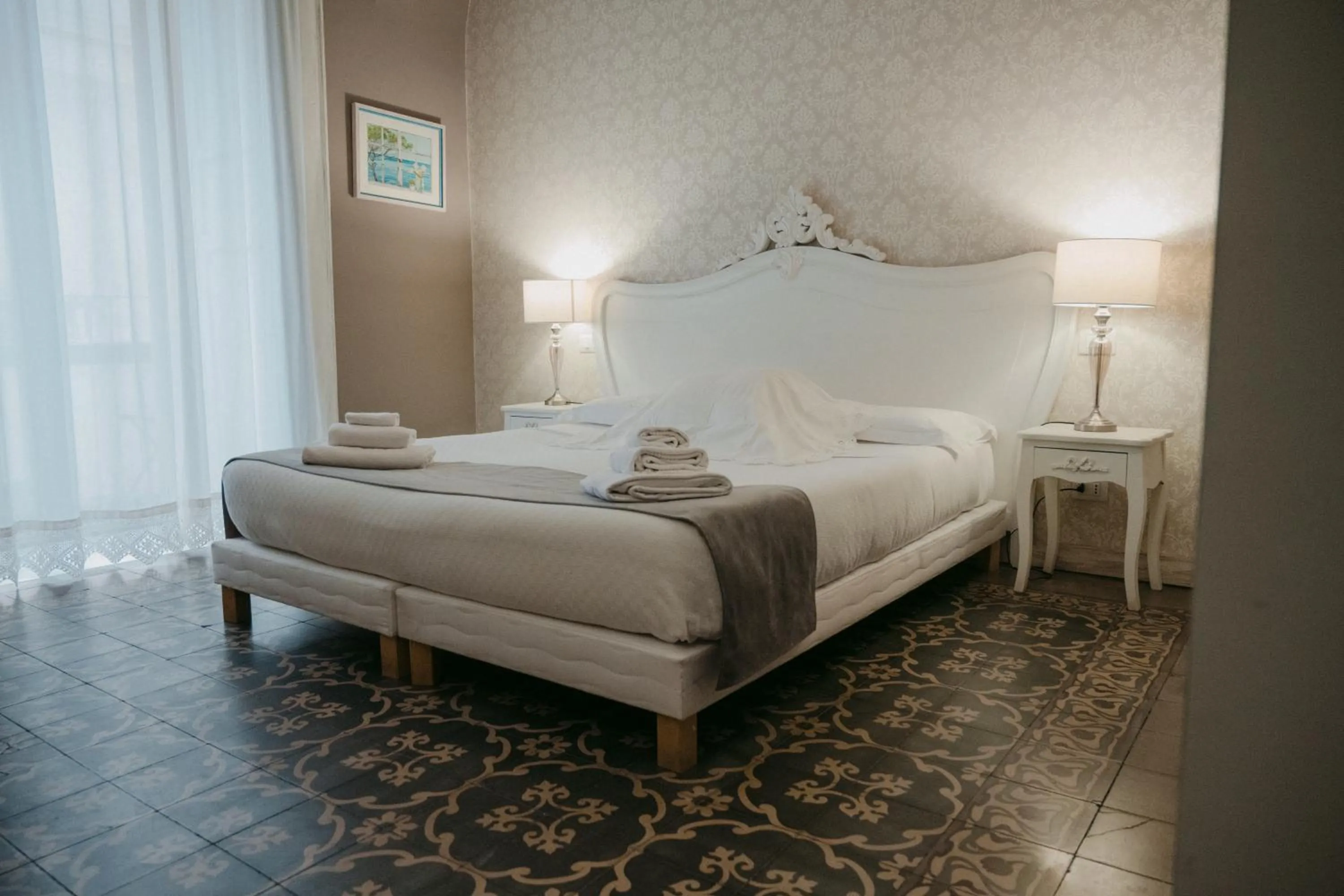 Bed in La Casa di Alma Luxury rooms