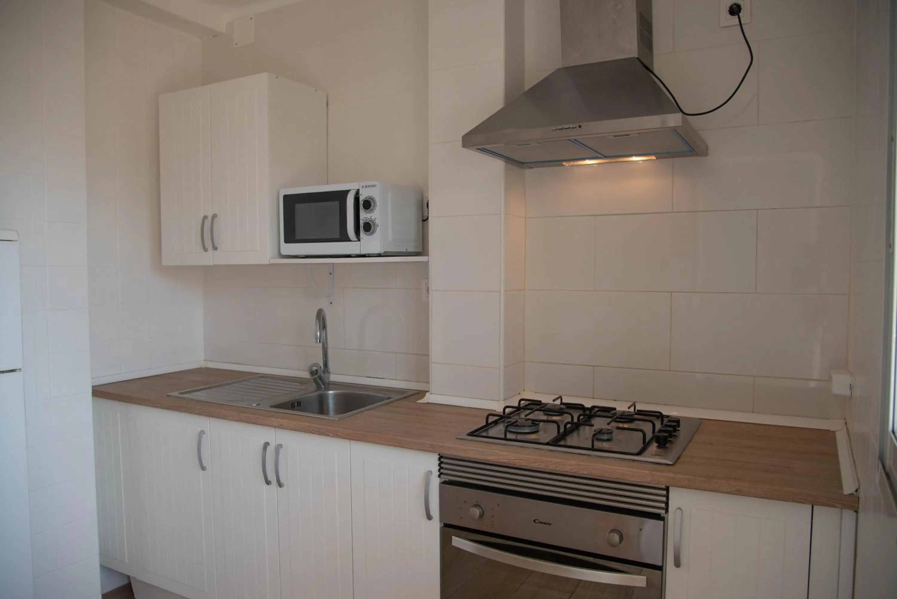 Kitchen or kitchenette in Apartamentos Maja
