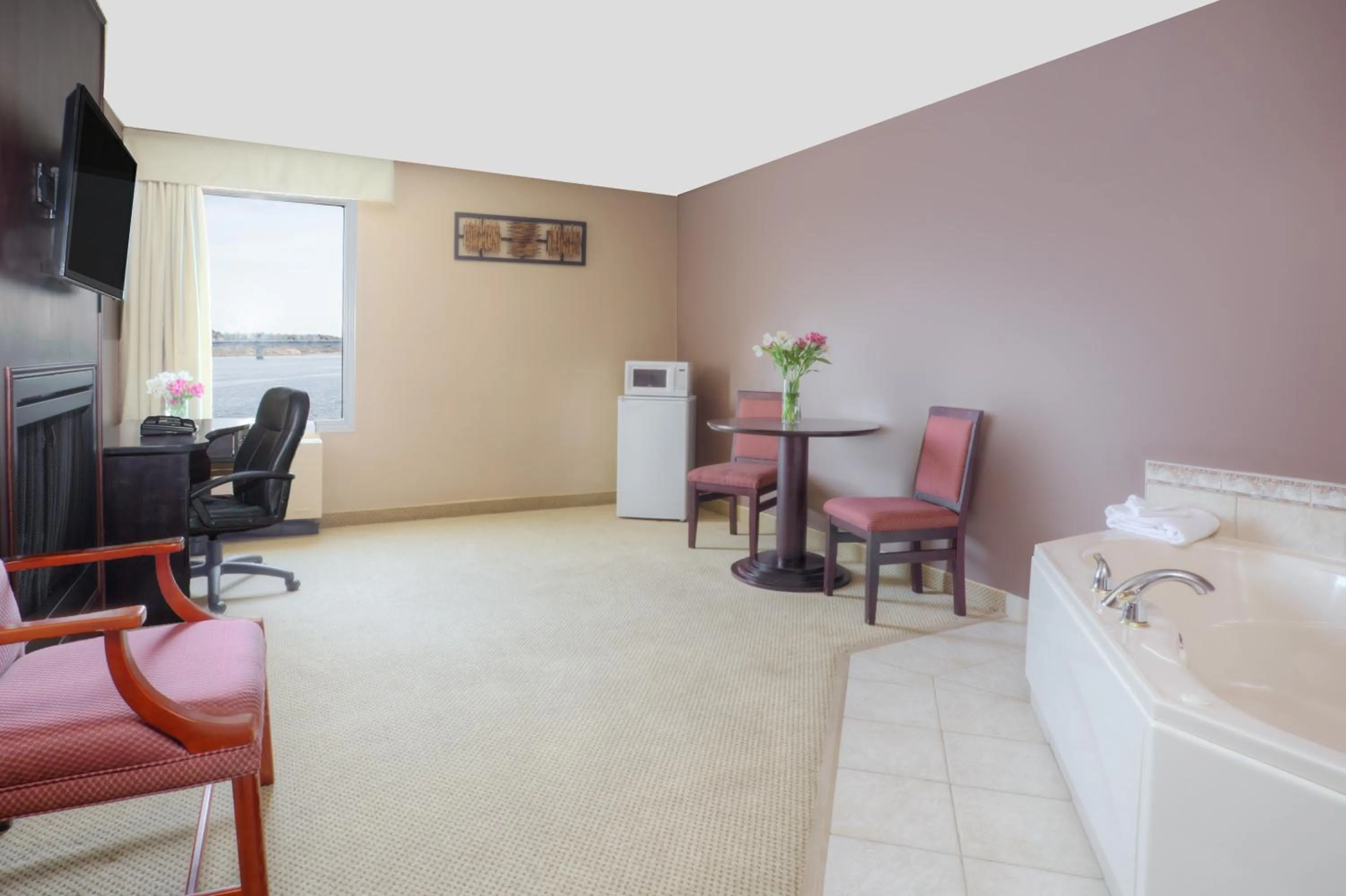 River view, Bed in Travelodge by Wyndham Miramichi New Brunswick