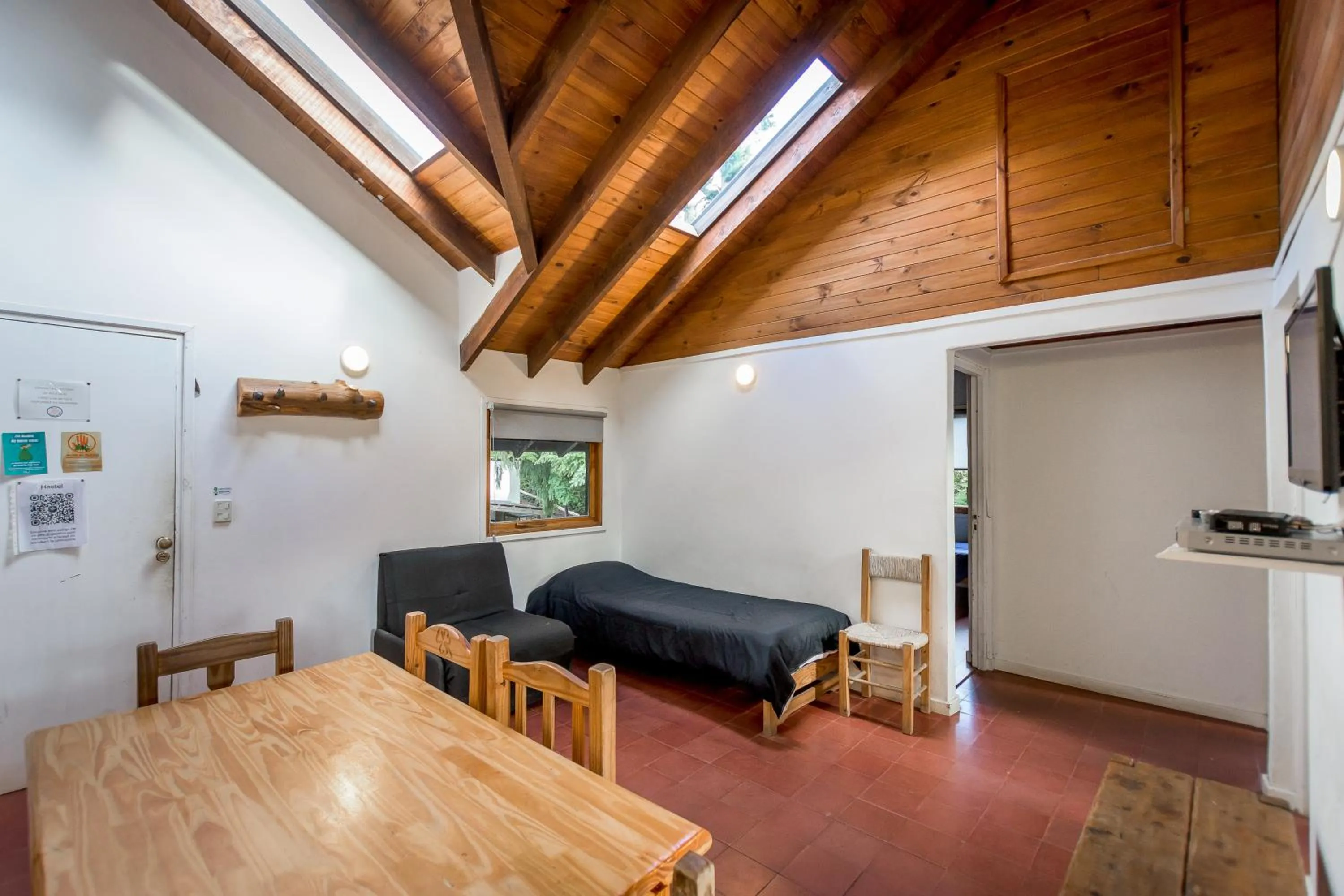 Communal lounge/ TV room in Hostel La Angostura