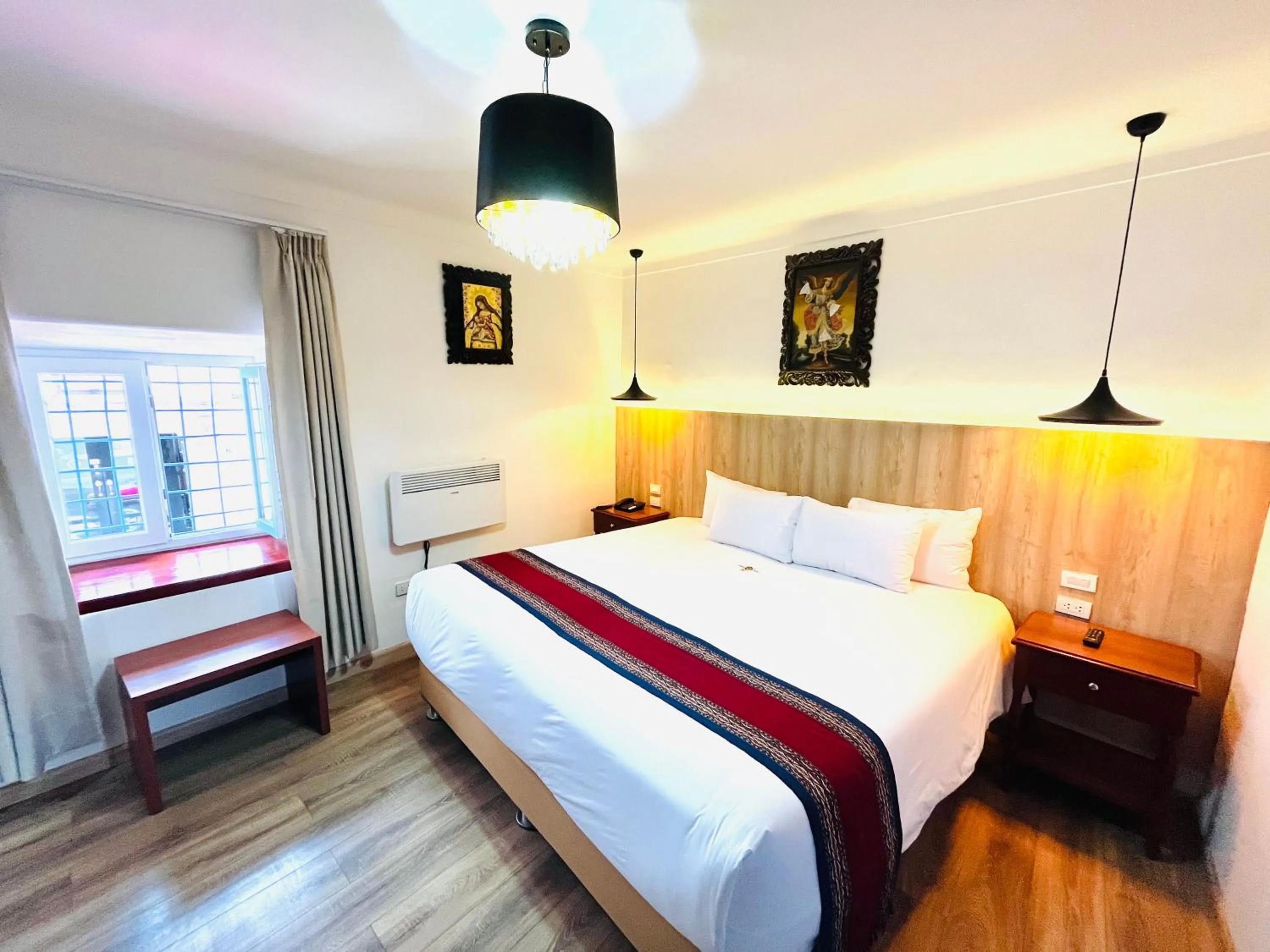 Bed in Hotel Rojas Inn