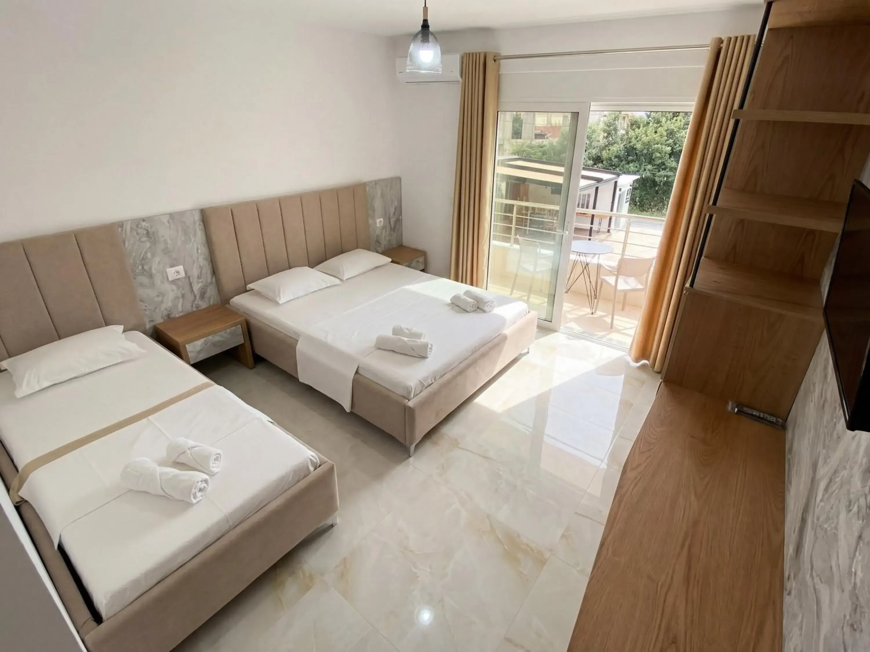 Deluxe Triple Room with Balcony in Hotel Four Islands Deluxe Triple Room with Balcony in Hotel Four Islands
