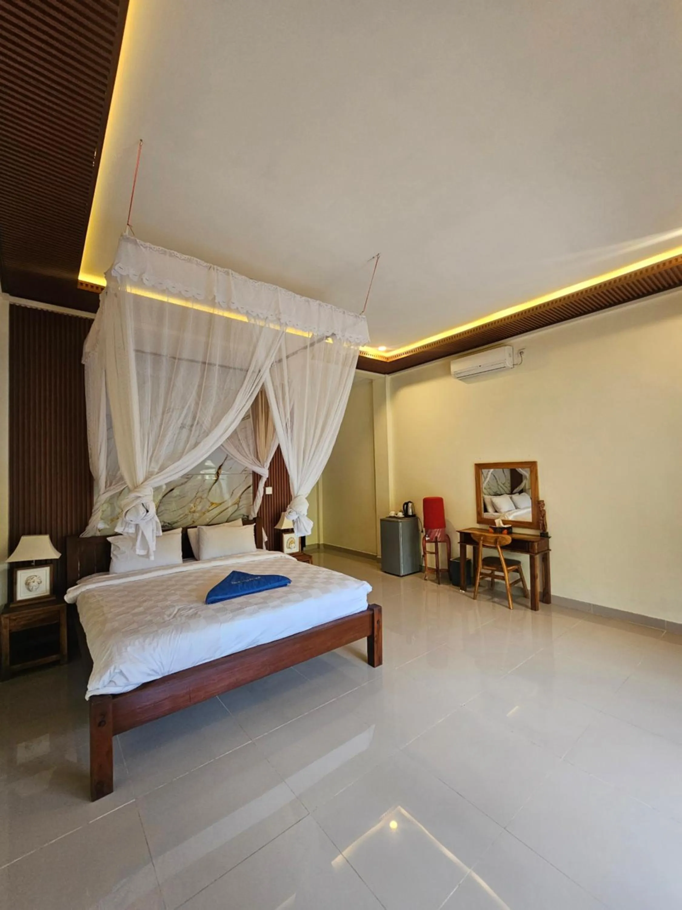 Bed in Bali Bhuana Beach Cottages