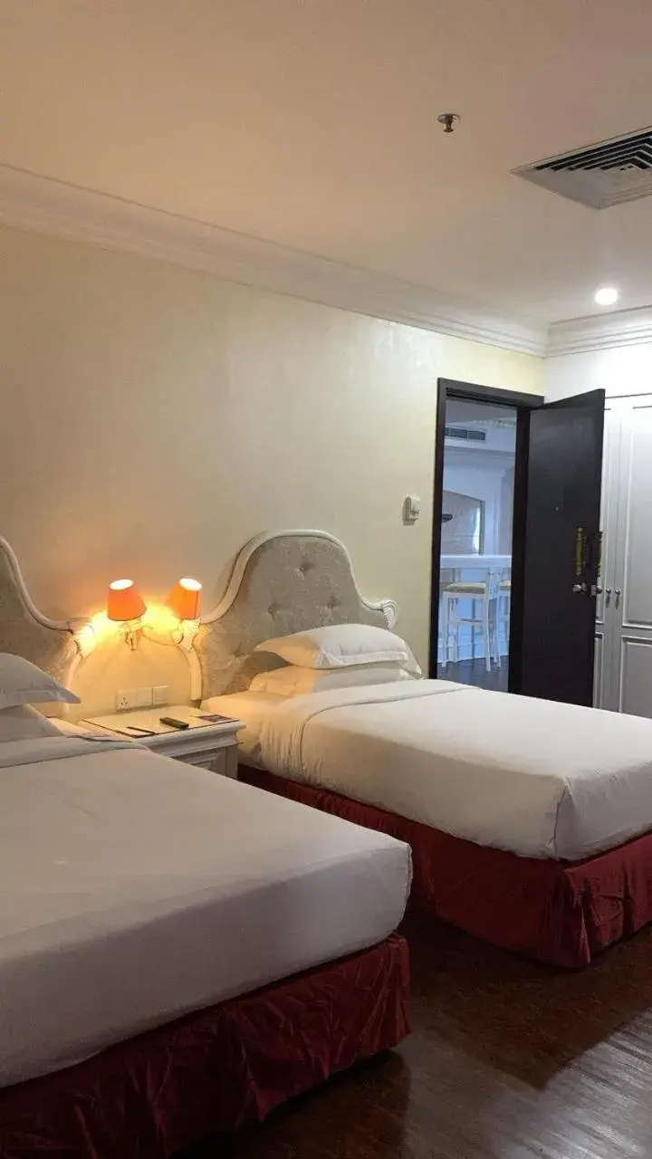 Bed in Pacific Palace Hotel Bed in Pacific Palace Hotel