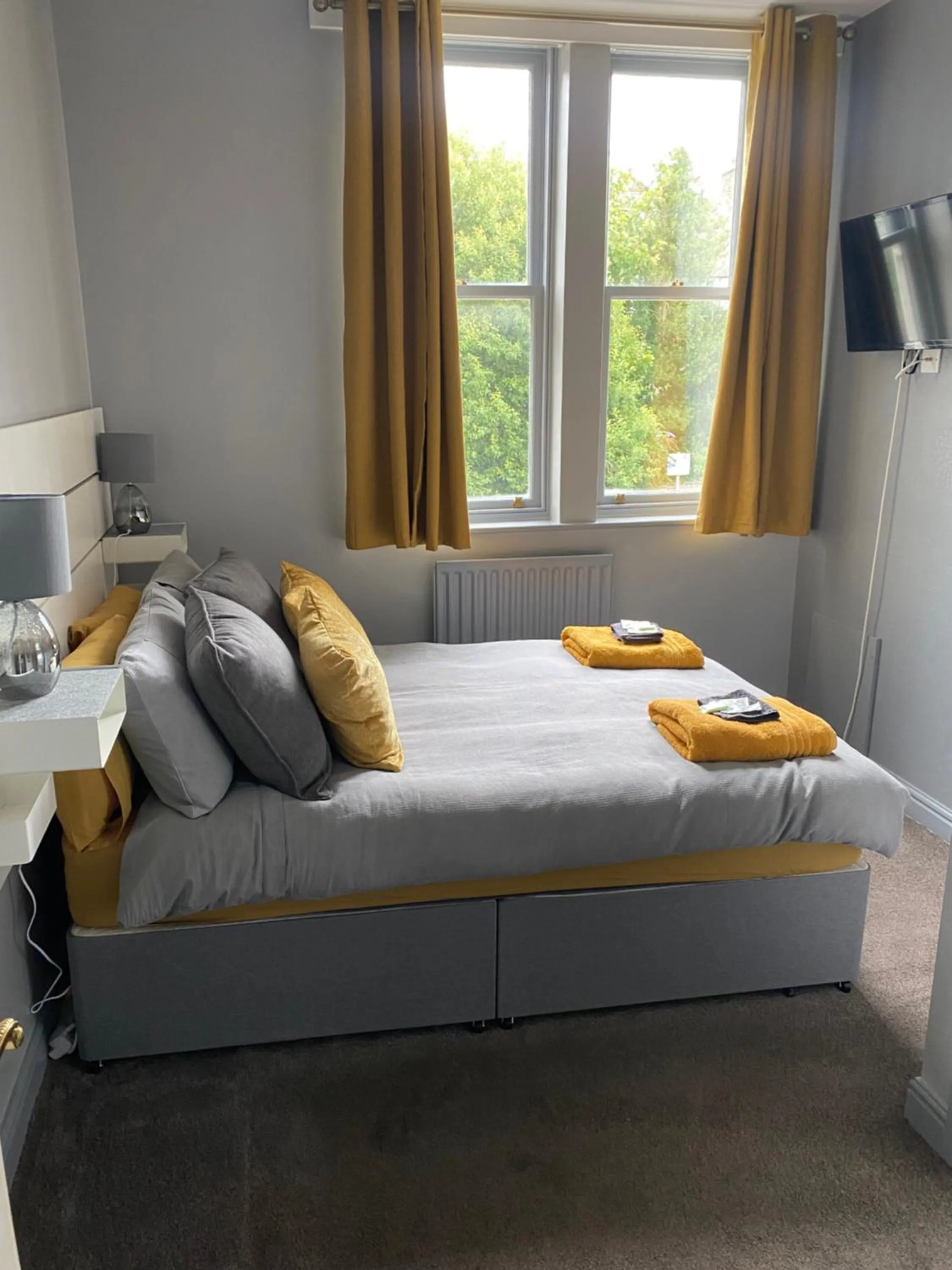 Bed in Hall Park Hotel self check in