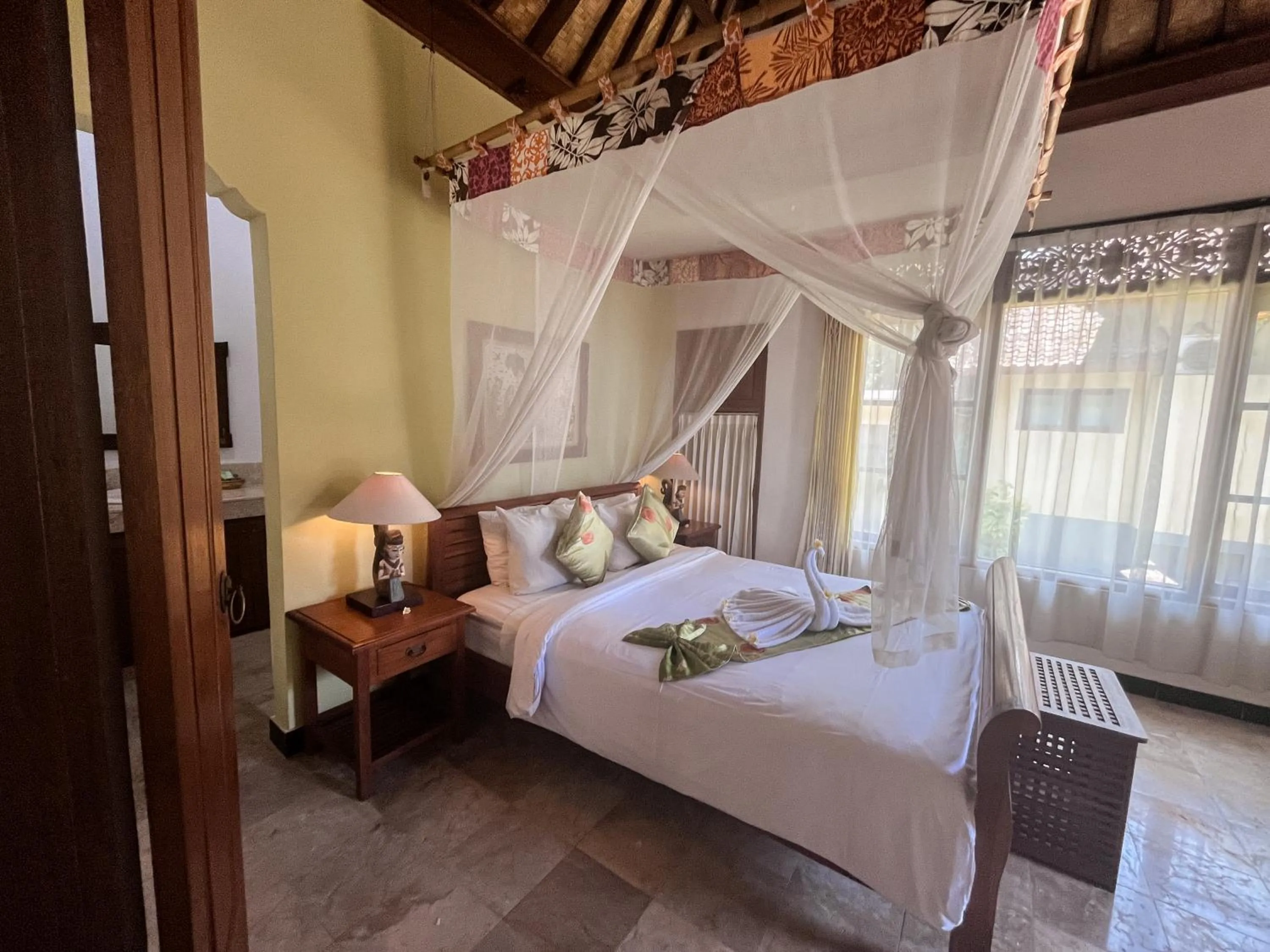 Bed in Apa Kabar Villas