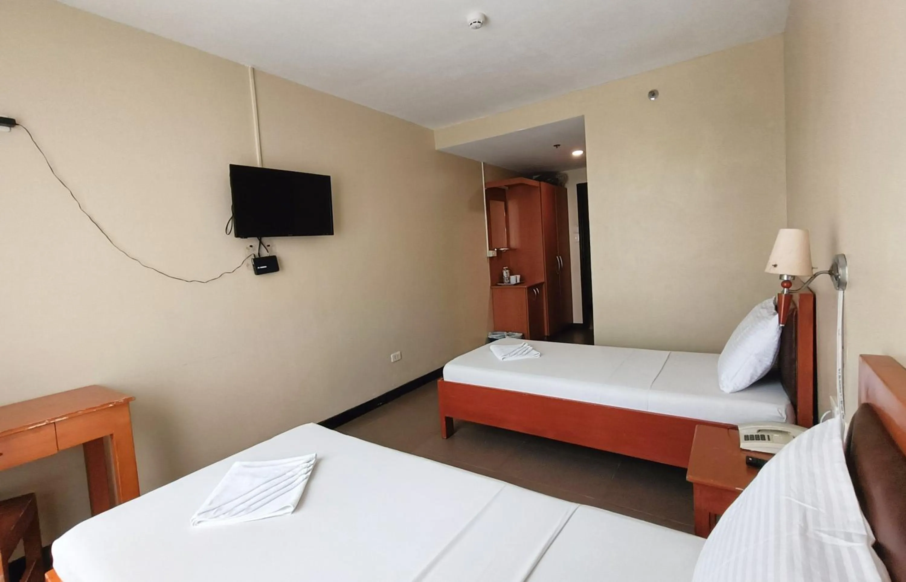 Bed in Fuente Oro Business Suites Cebu