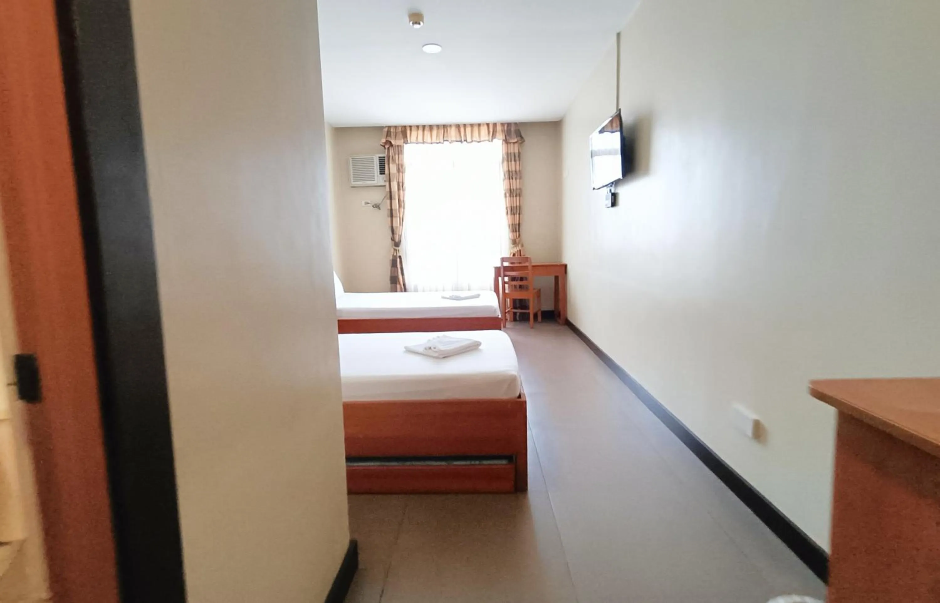 Bed in Fuente Oro Business Suites Cebu