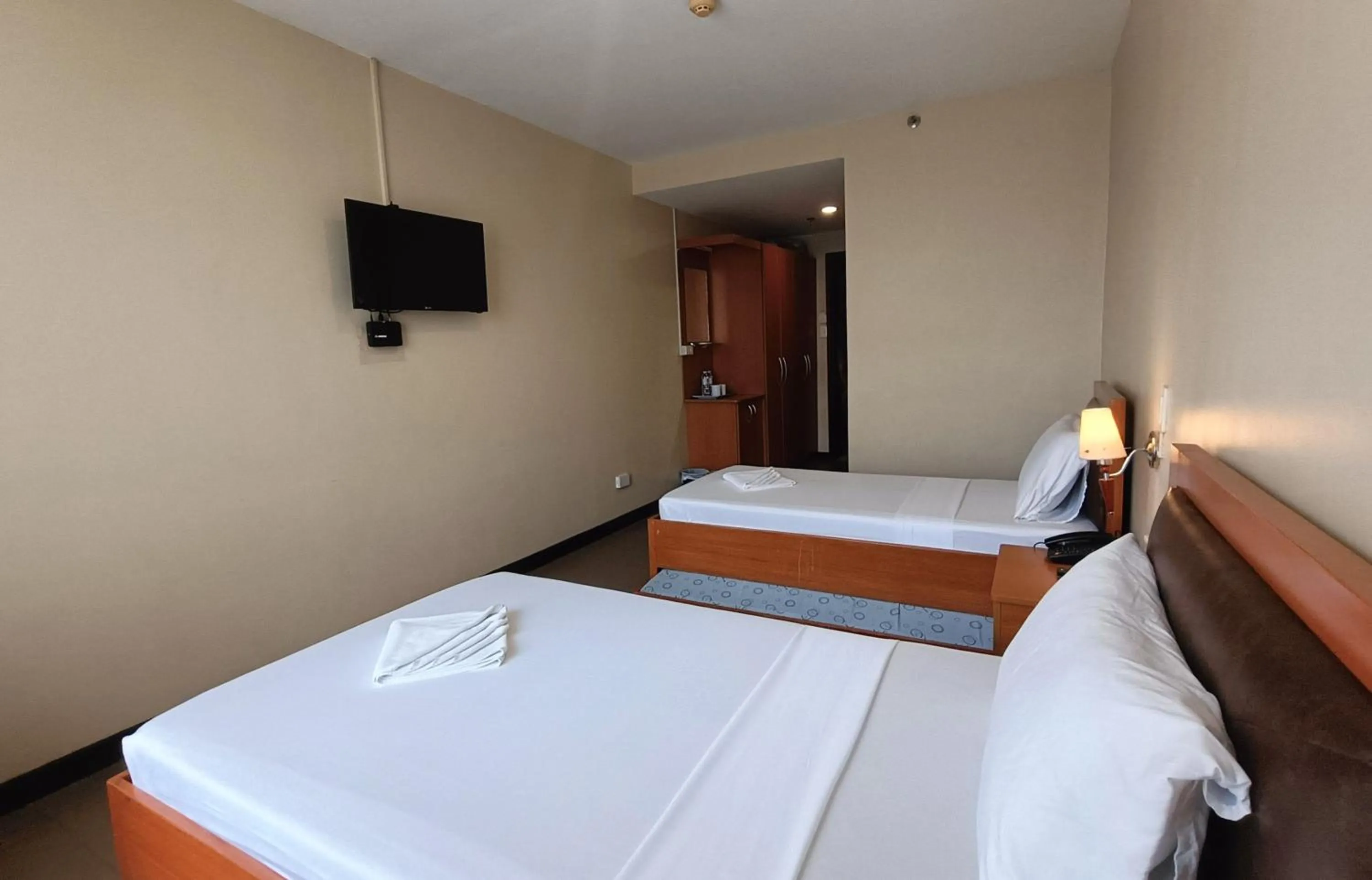 Bed in Fuente Oro Business Suites Cebu