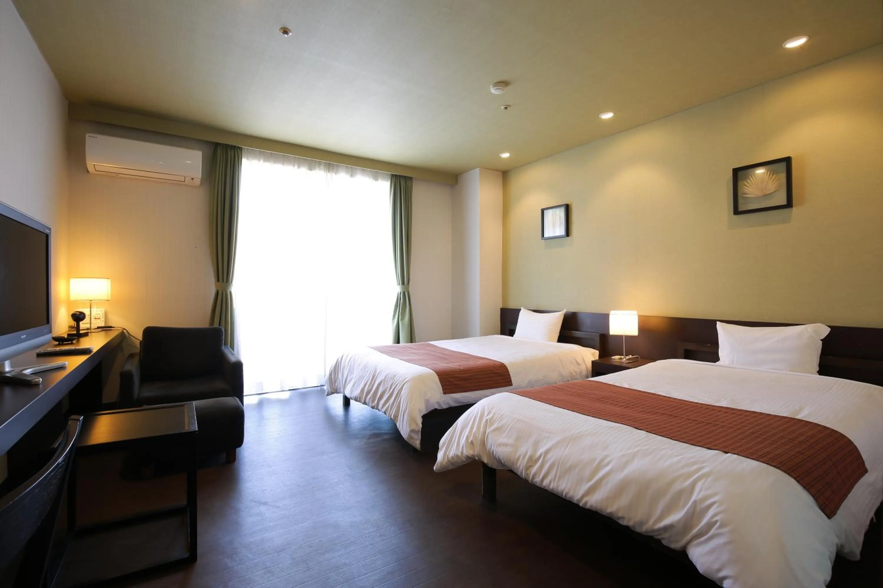 Bed in Kirishima Kanko Hotel