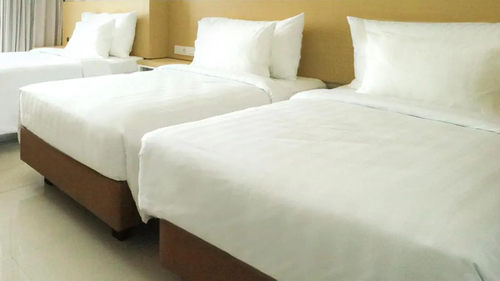 Bed in PALM PARK Hotel Surabaya Bed in PALM PARK Hotel Surabaya