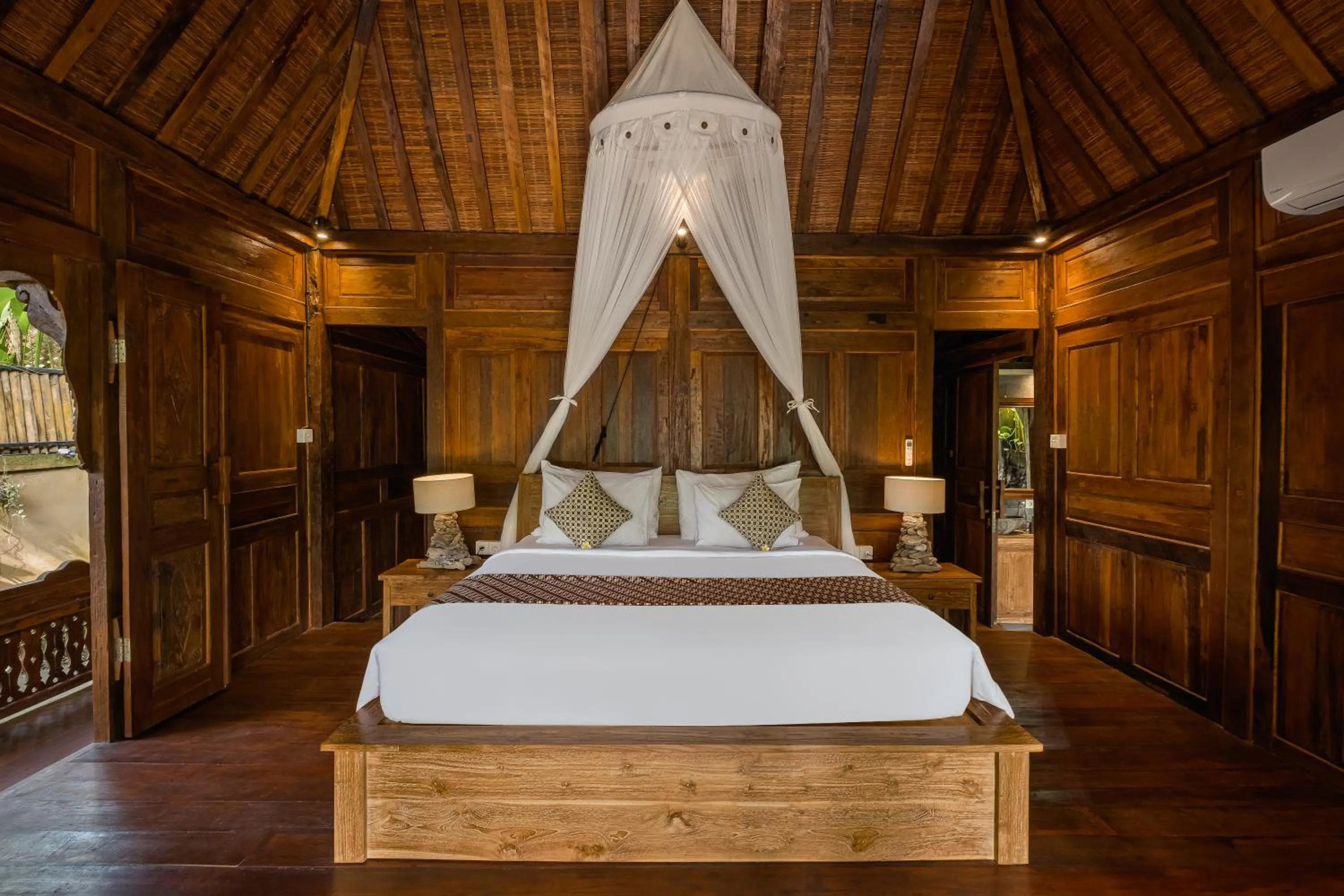 Bed in Mandana Ubud Villa