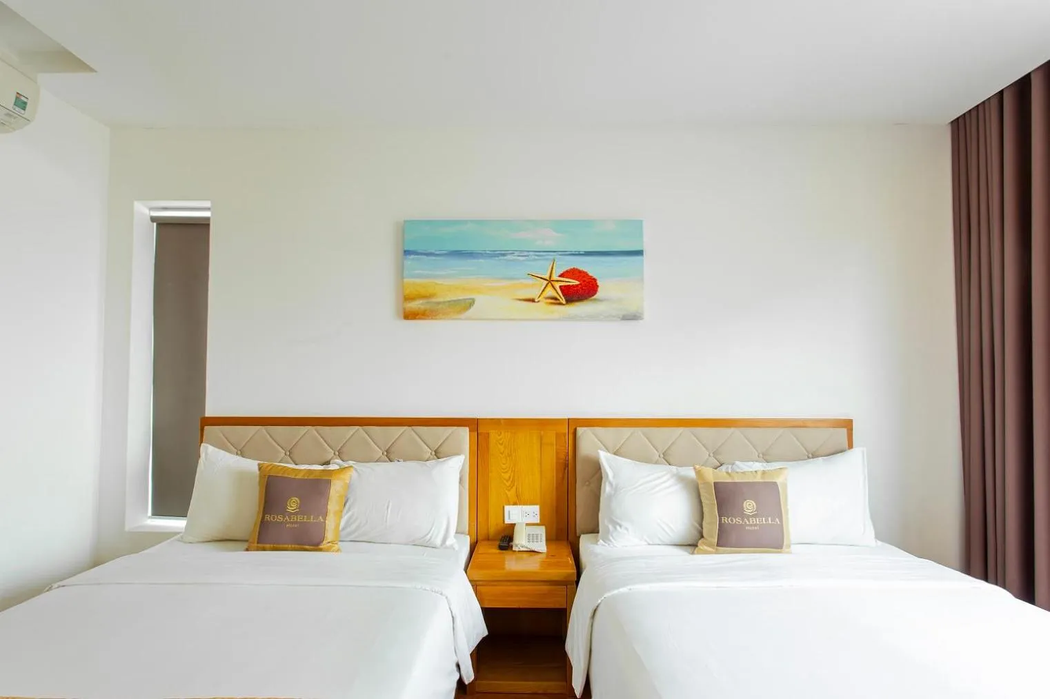 Bed in Rosabella Boutique Hotel