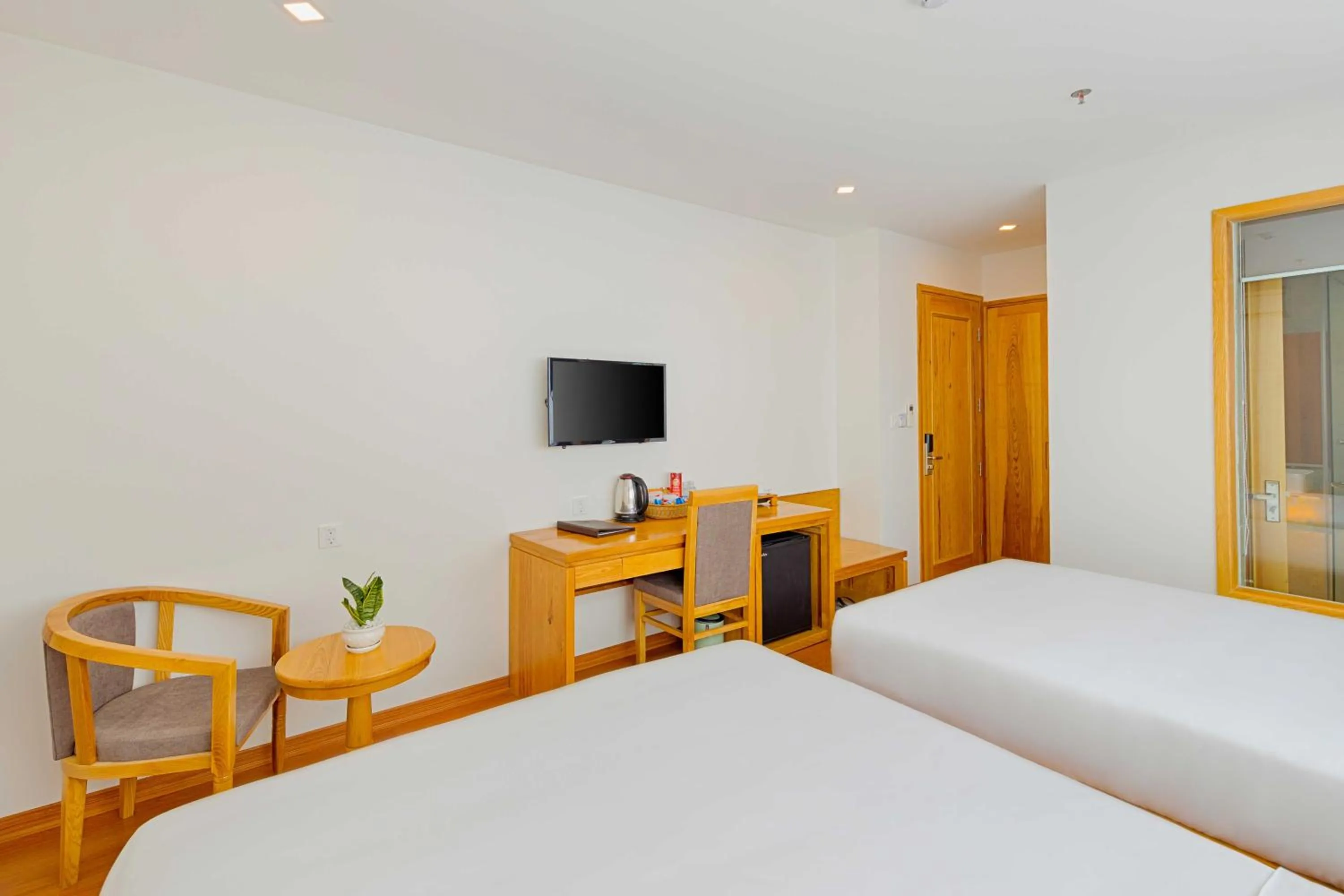 Communal lounge/ TV room, Bed in Rosabella Boutique Hotel