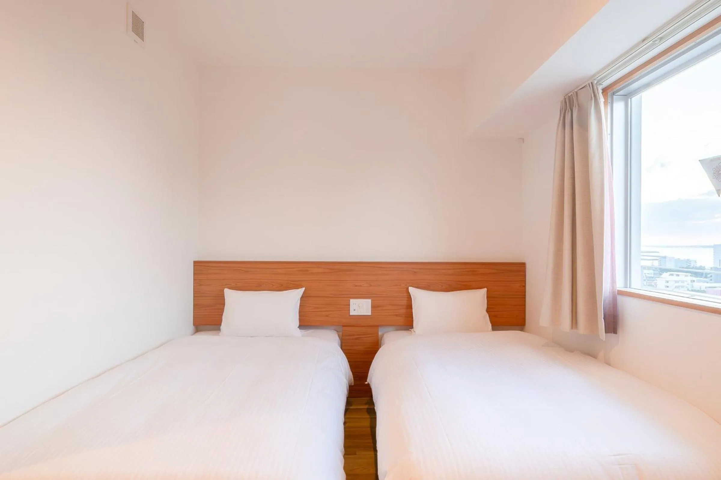 Photo of the whole room, Bed in Smile Hotel Miyakojima