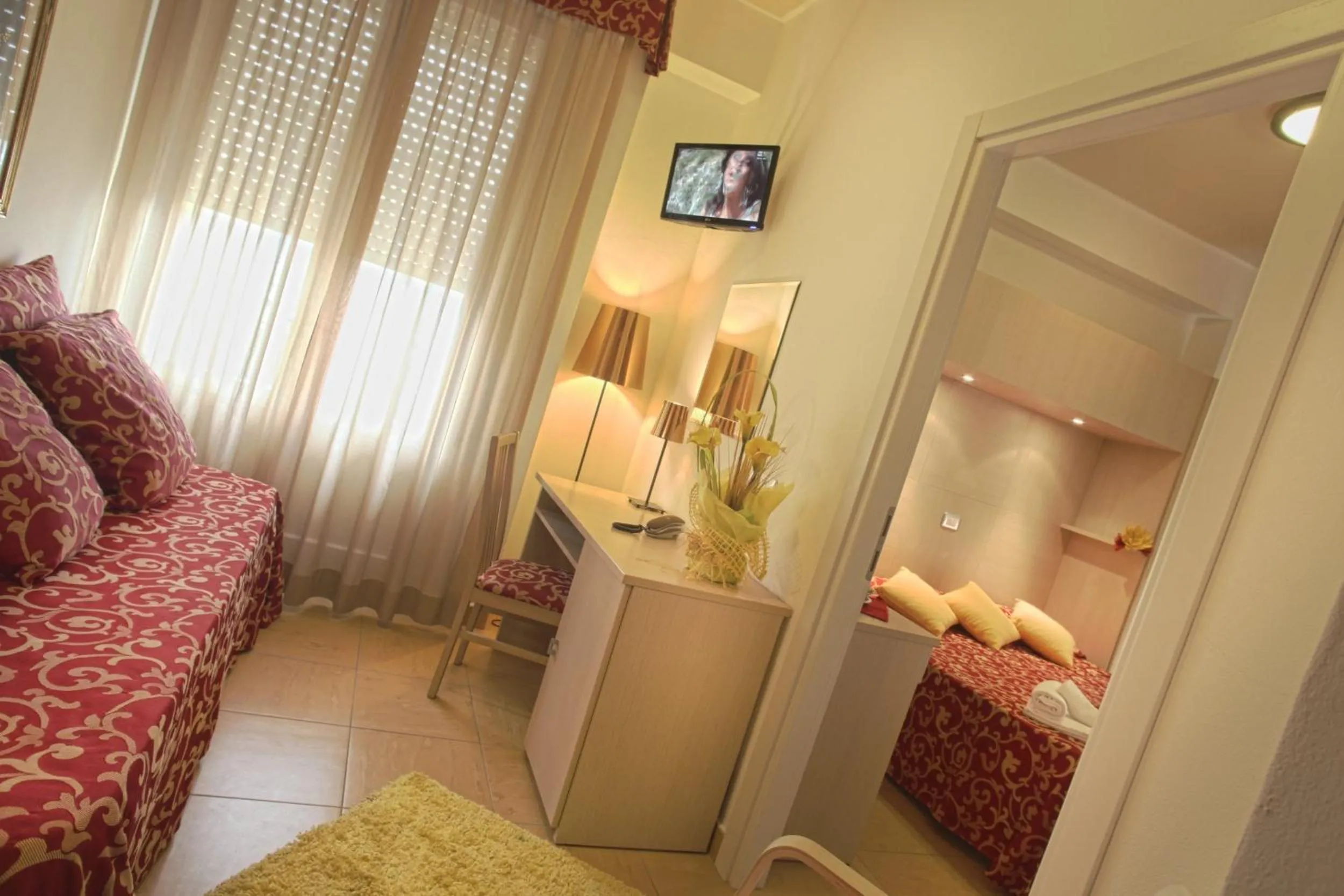 Bedroom in Hotel Mimosa