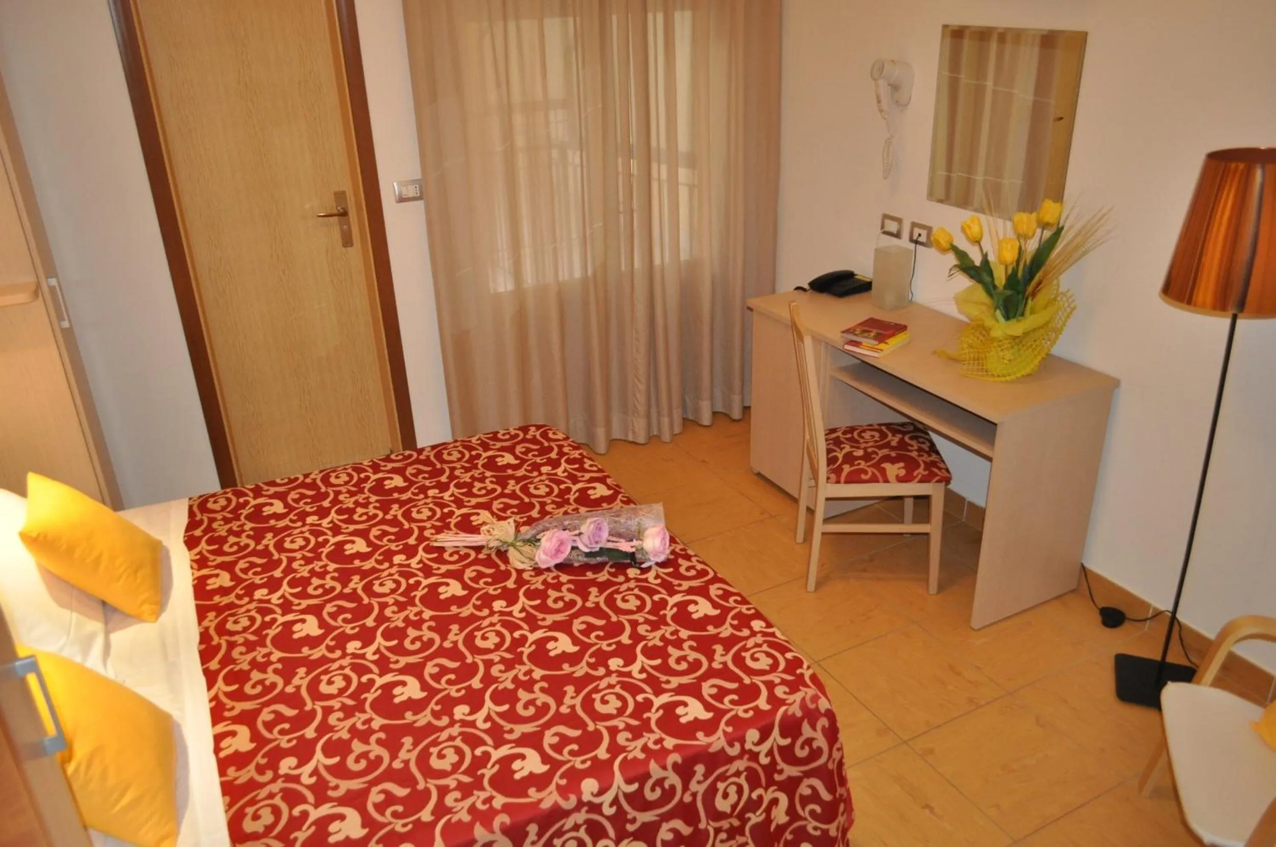 Bedroom in Hotel Mimosa