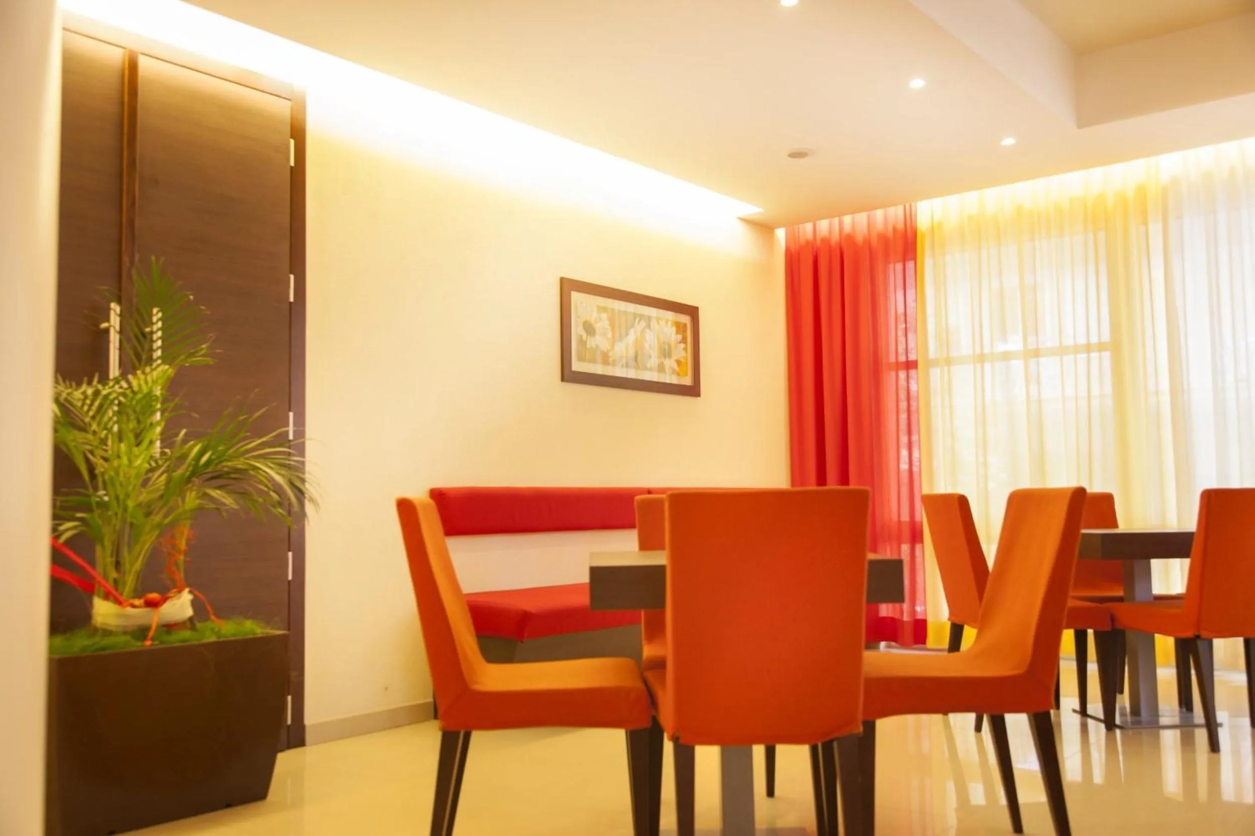 Communal lounge/ TV room in Hotel Mimosa