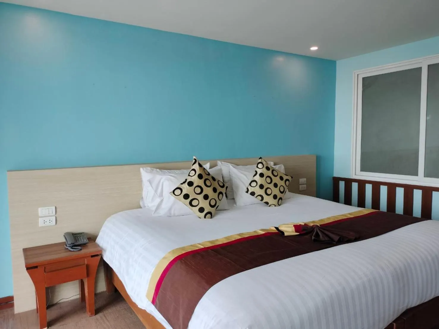 Bed in Saisawan Beach Luxury Hotel