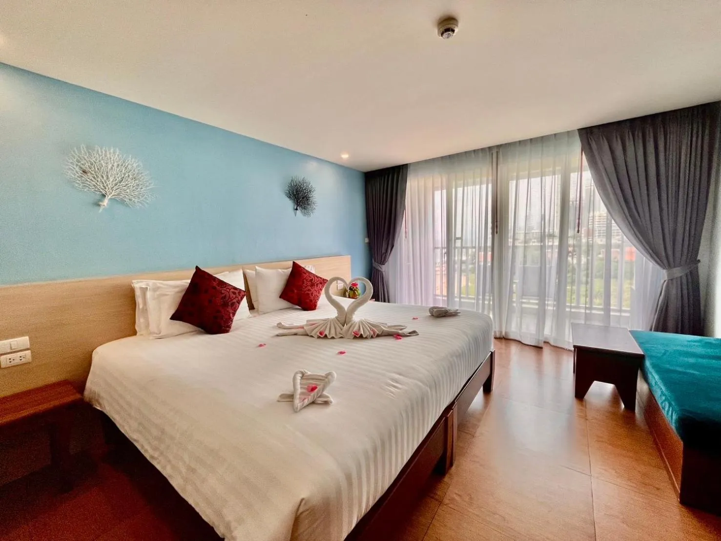 Bed in Saisawan Beach Luxury Hotel