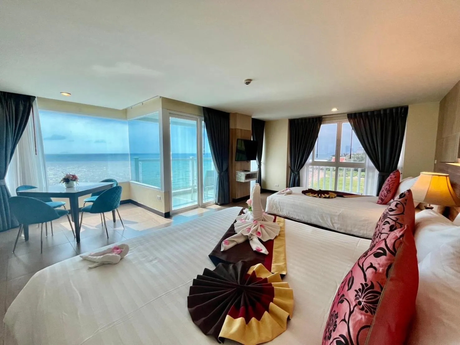 Photo of the whole room, Bed in Saisawan Beach Luxury Hotel