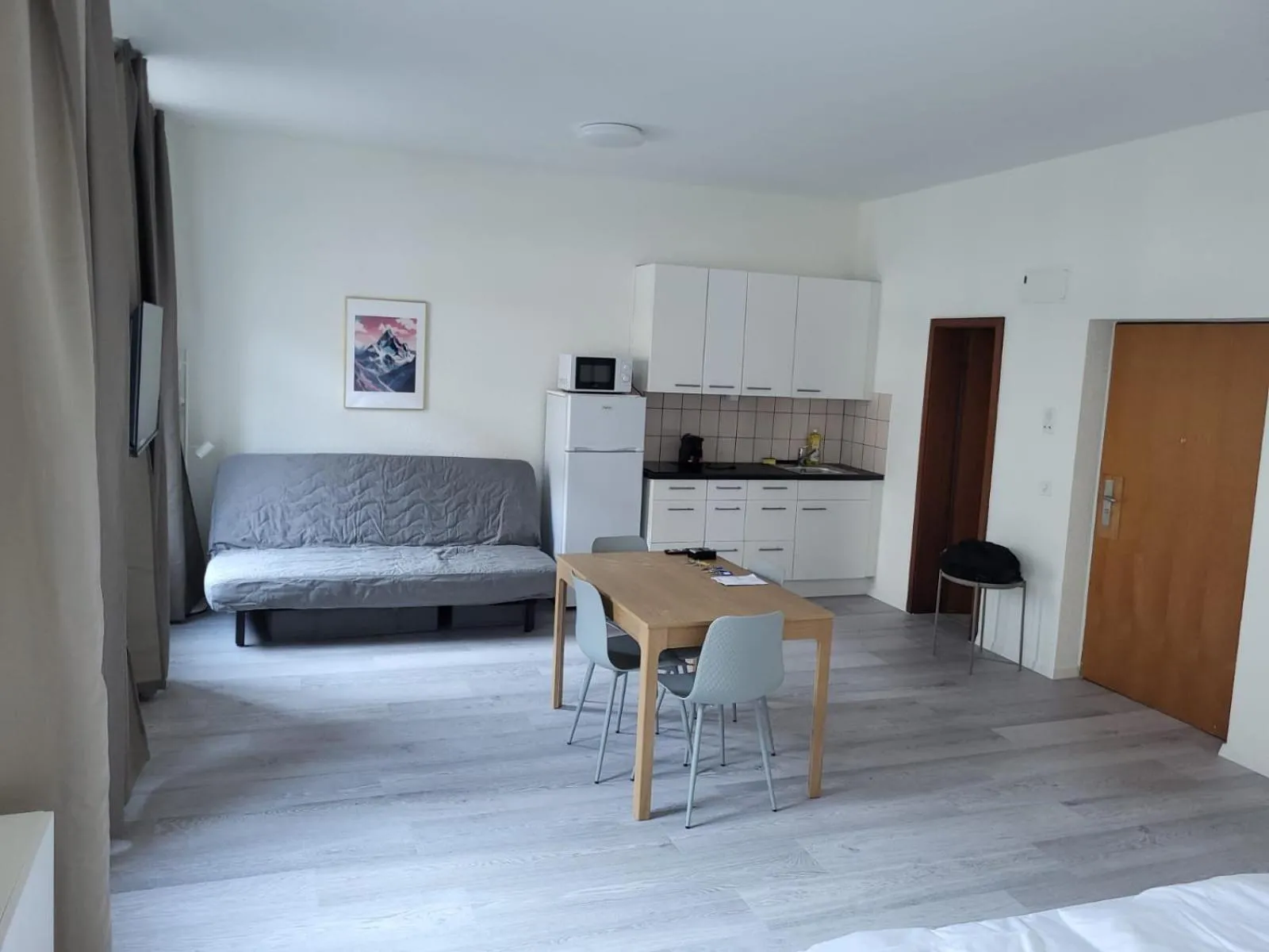Kitchen or kitchenette in HITrental Seefeld - Kreuzstrasse Apartments
