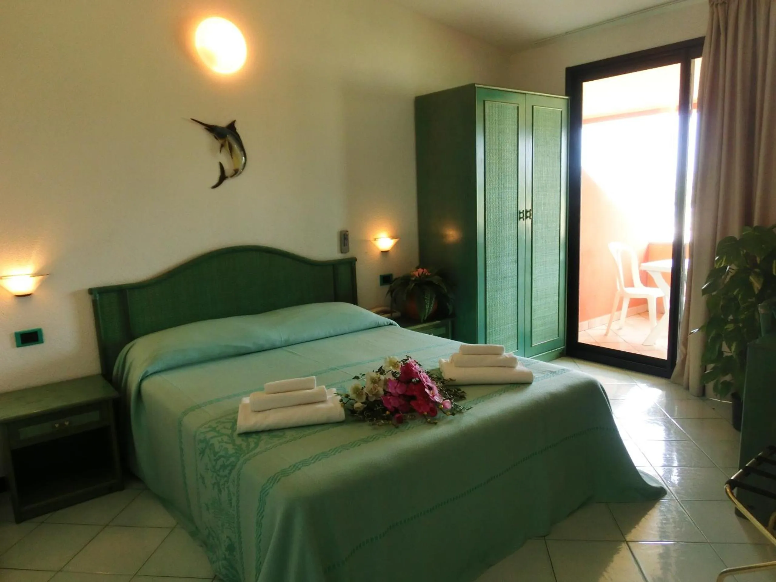 Bed in Hotel Blu Marlin