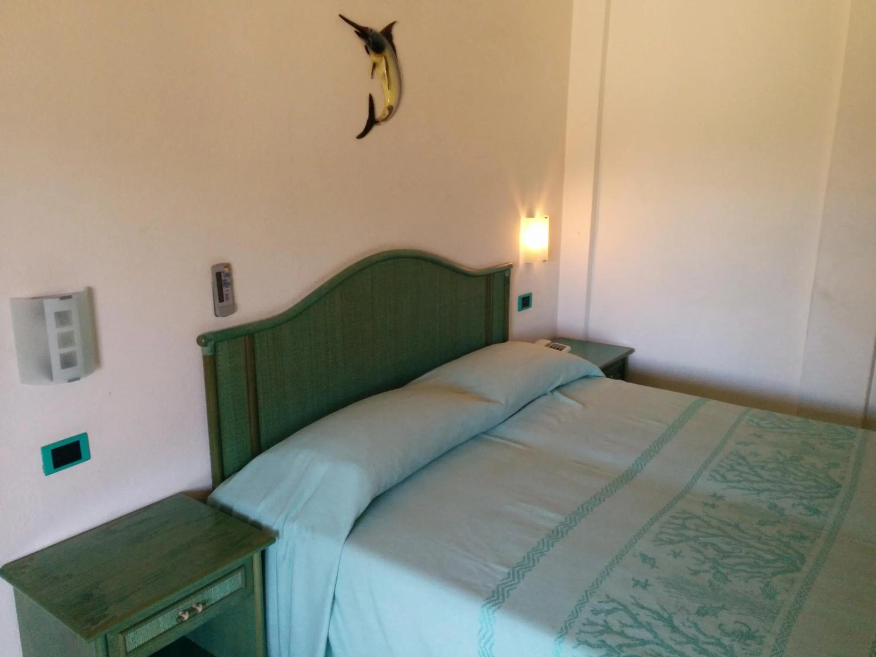 Bed in Hotel Blu Marlin