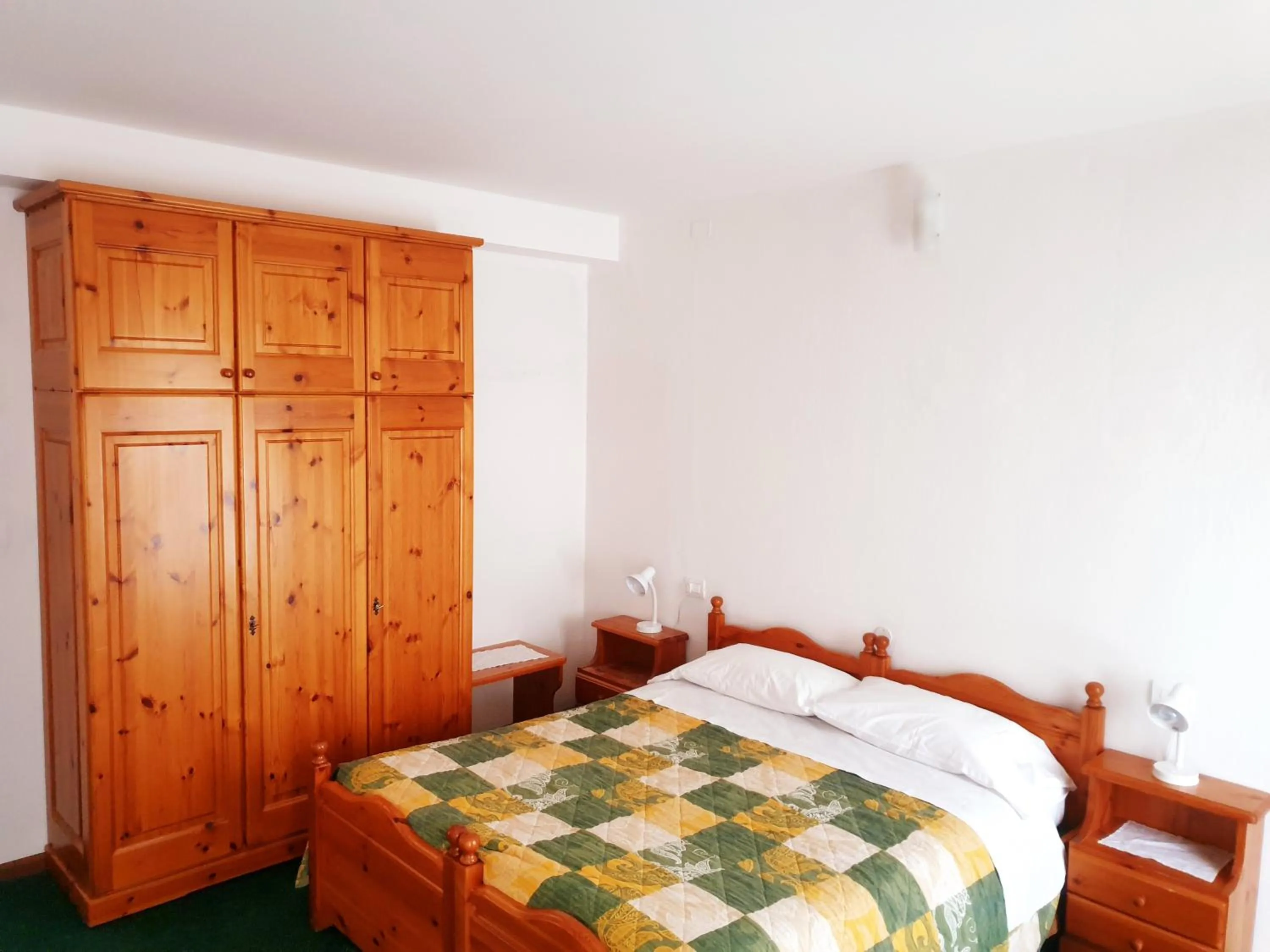 Photo of the whole room, Bed in Albergo Trieste