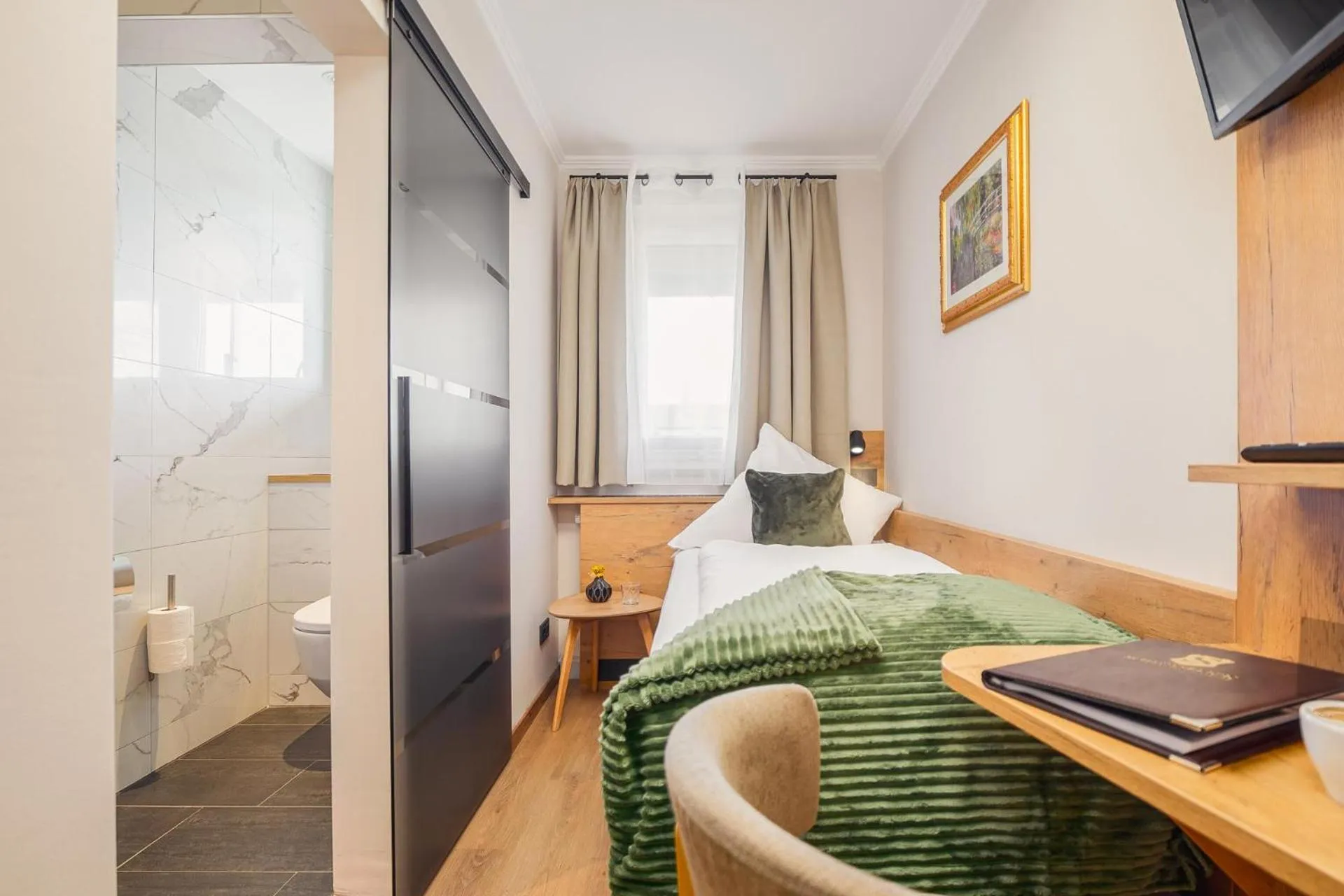 Photo of the whole room, Bed in Hotel Schlossblick Chiemsee