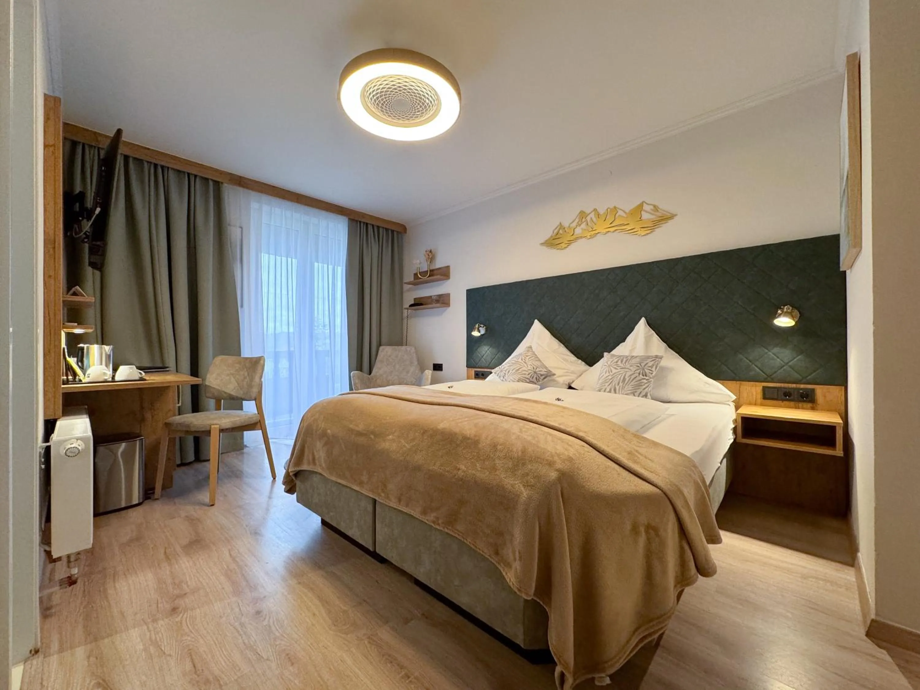 Photo of the whole room, Bed in Hotel Schlossblick Chiemsee