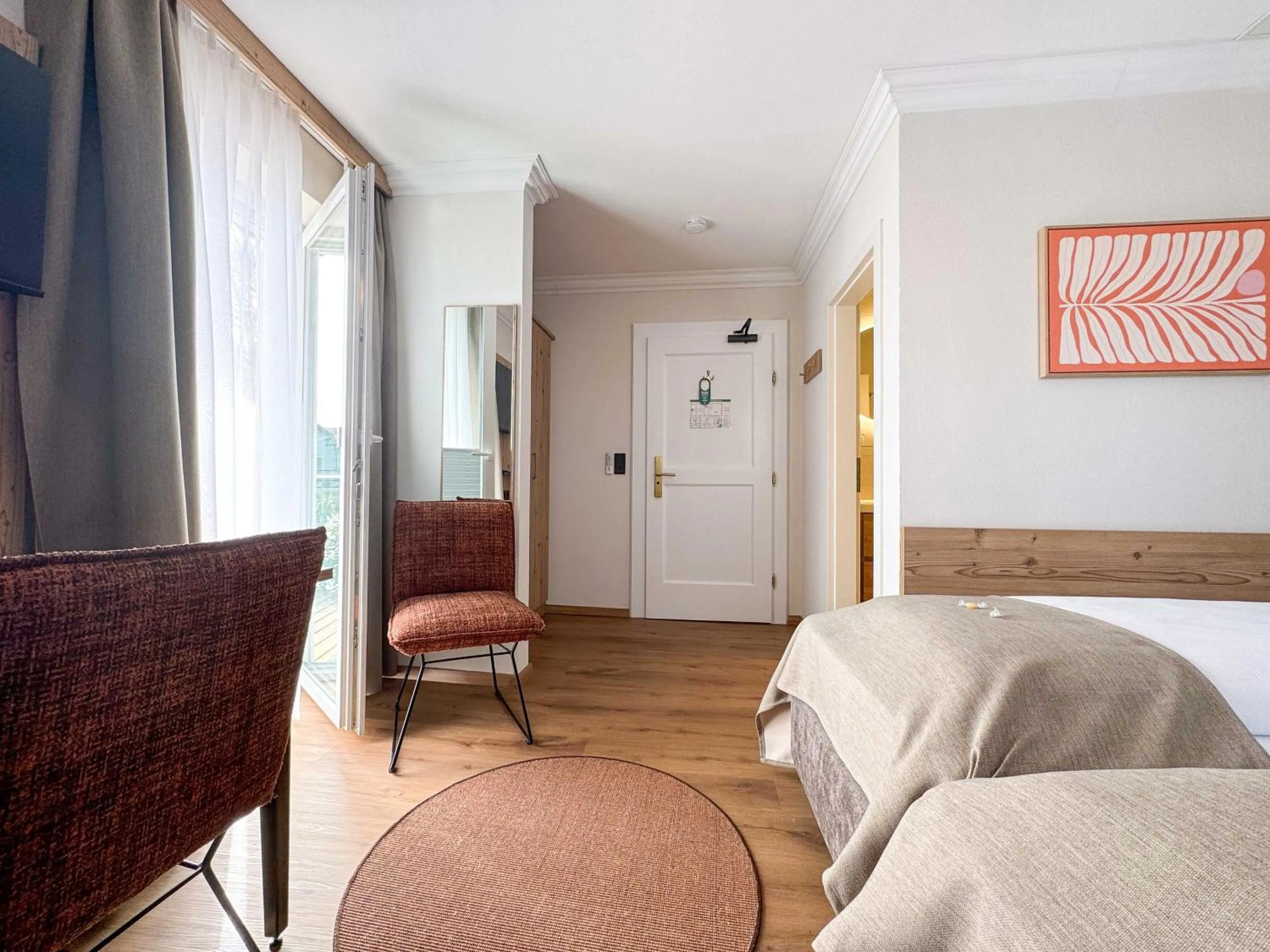 Photo of the whole room, Bed in Hotel Schlossblick Chiemsee