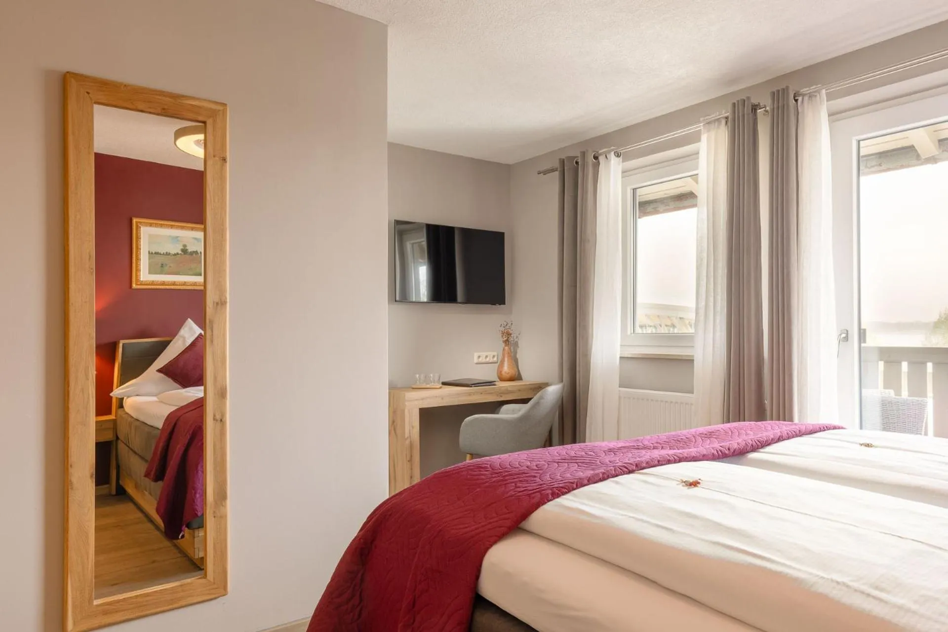 Photo of the whole room, Bed in Hotel Schlossblick Chiemsee