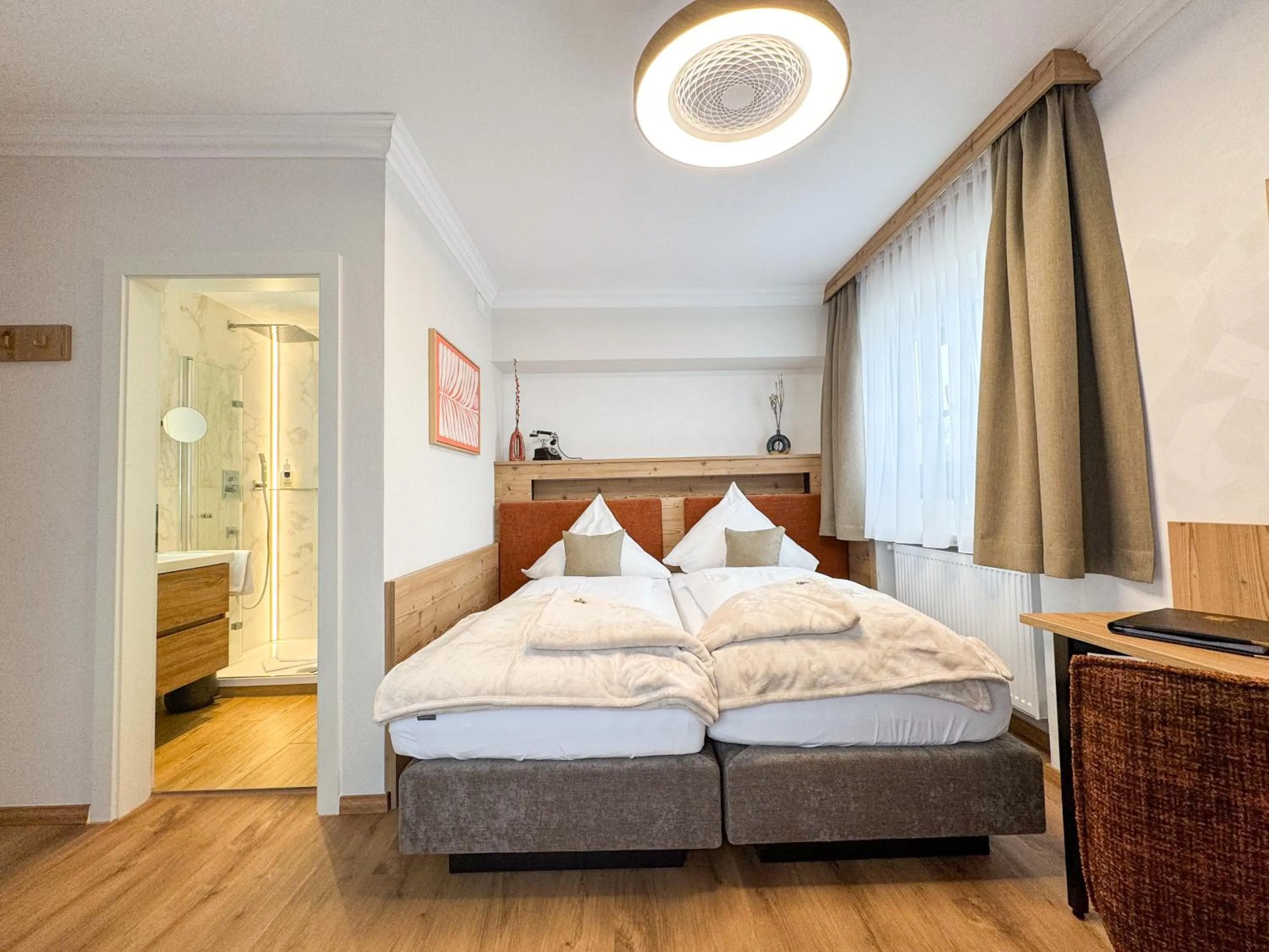 Photo of the whole room, Bed in Hotel Schlossblick Chiemsee