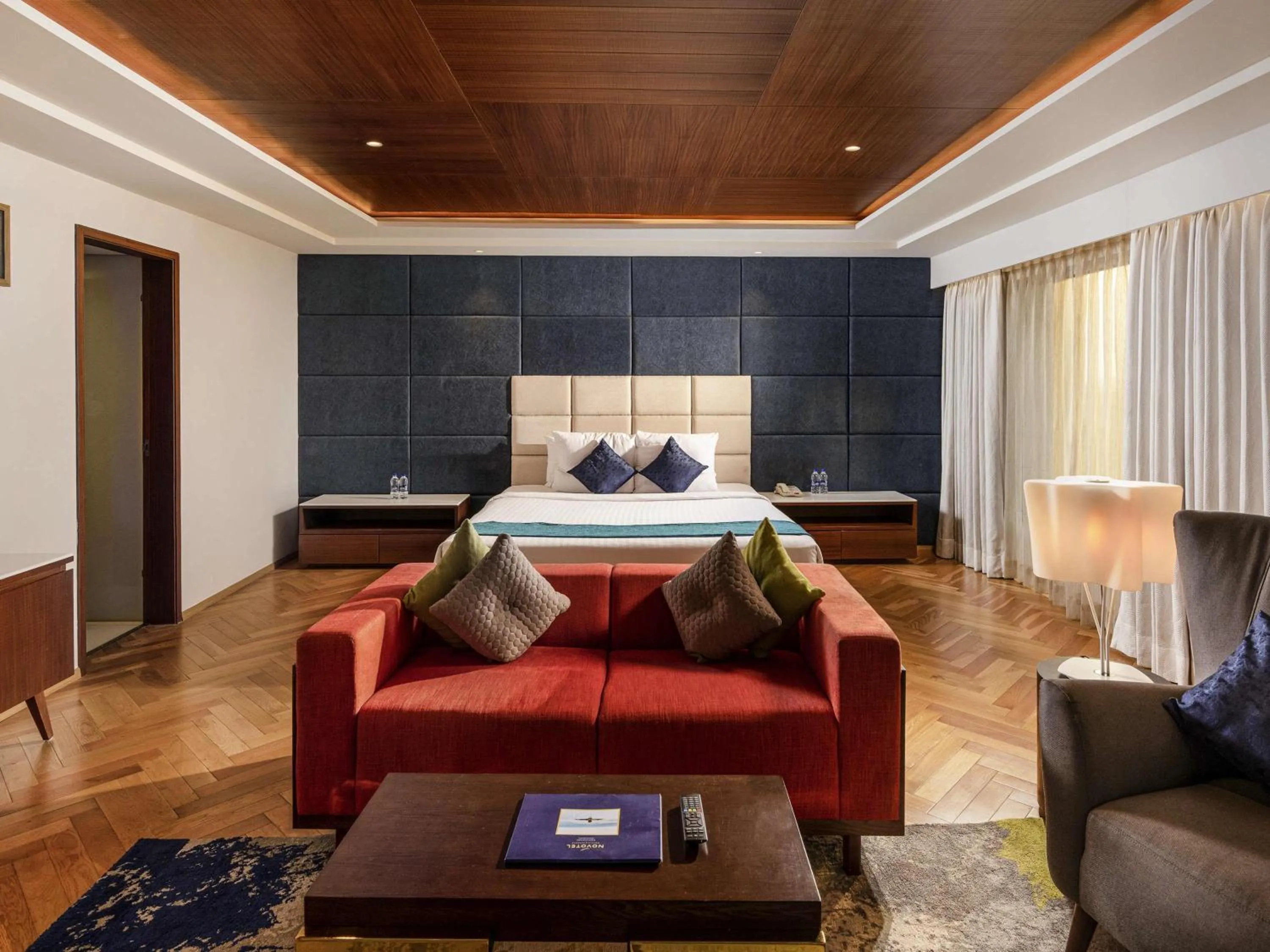 Photo of the whole room, Bed in Novotel Vijayawada Varun