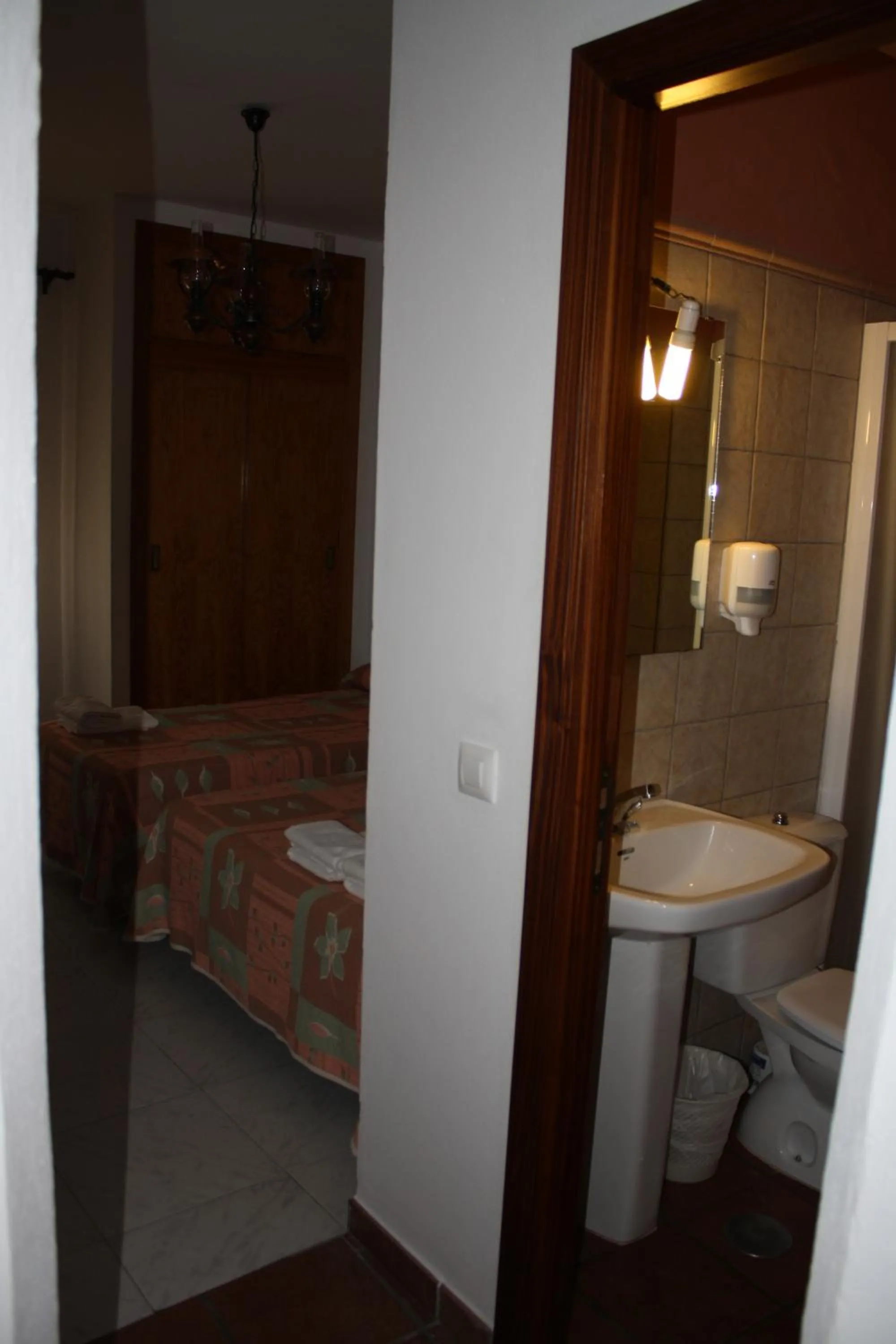 Photo of the whole room, Bed in Hostal Torre de Guzmán