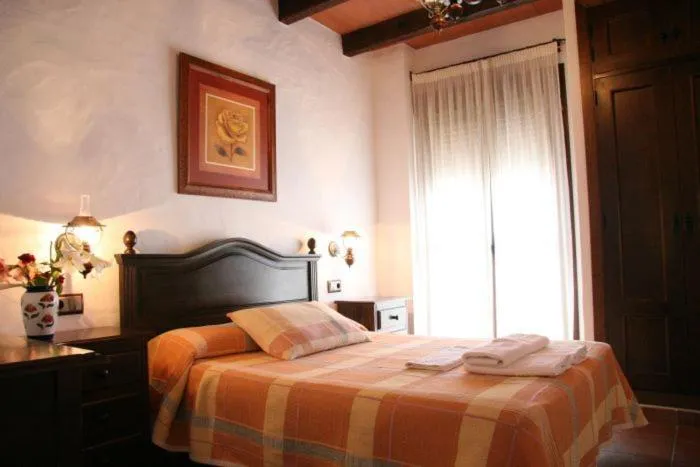 Photo of the whole room, Bed in Hostal Torre de Guzmán