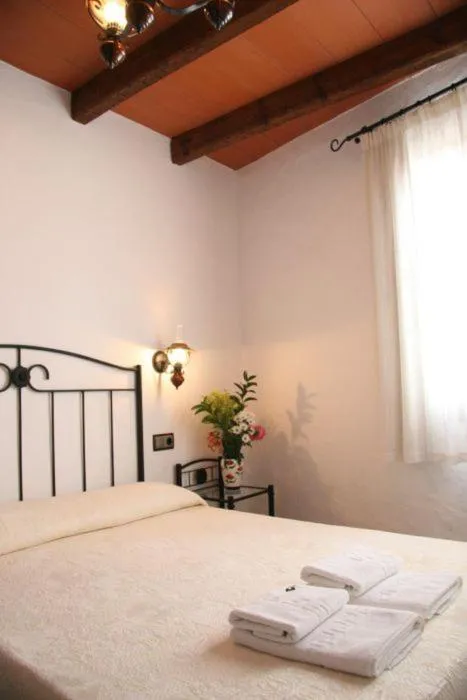 Photo of the whole room, Bed in Hostal Torre de Guzmán