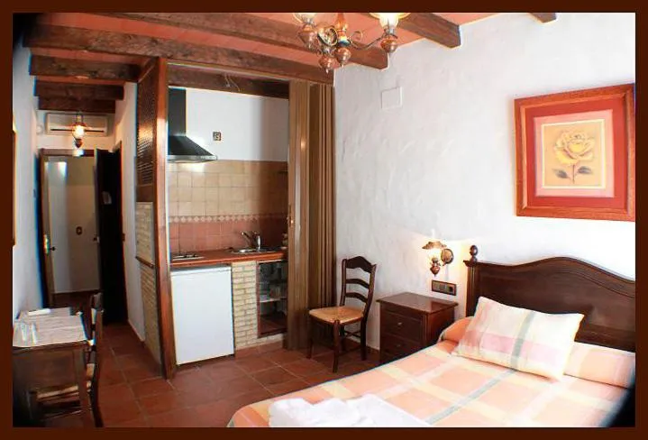 Photo of the whole room, Bed in Hostal Torre de Guzmán