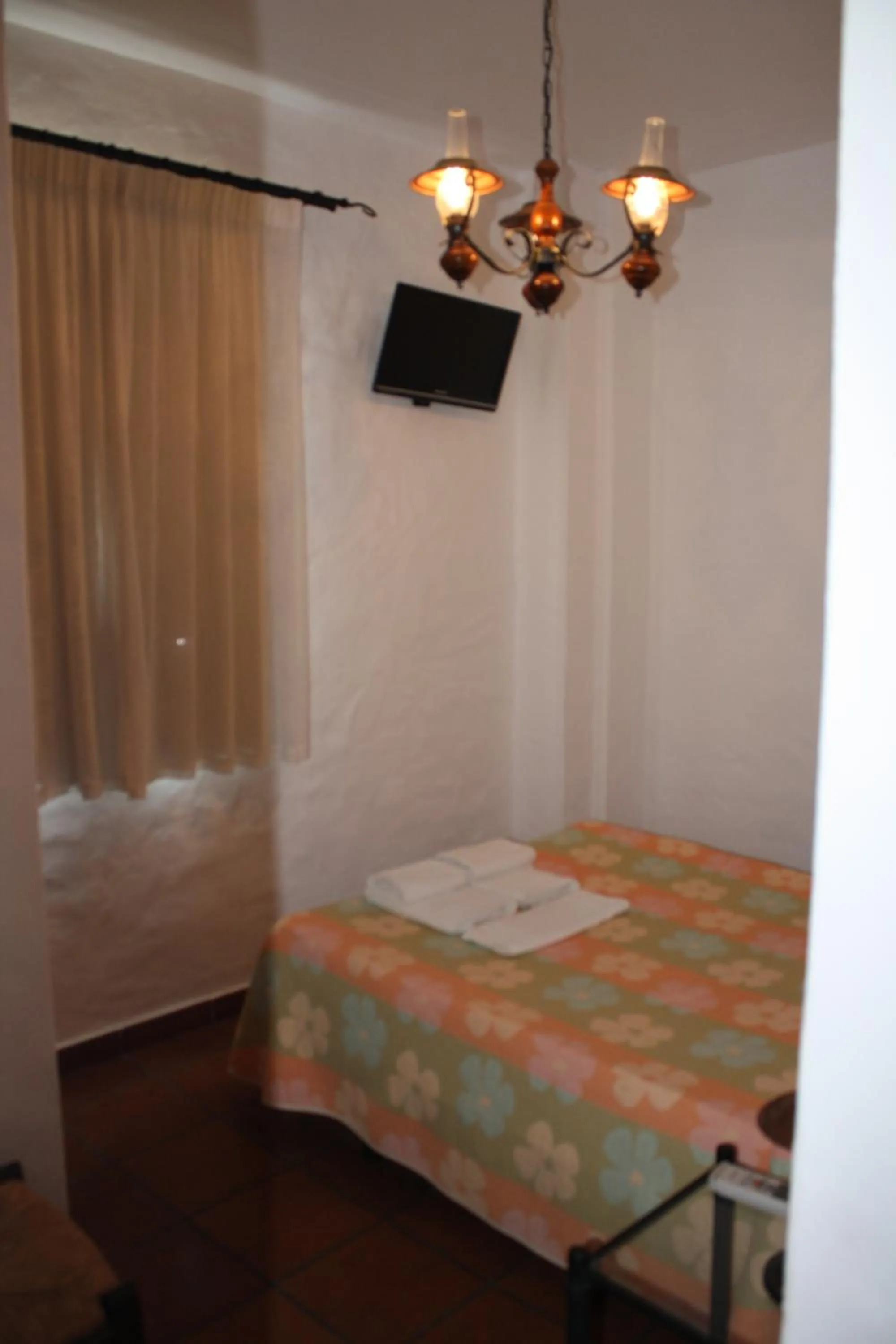 Photo of the whole room, Bed in Hostal Torre de Guzmán