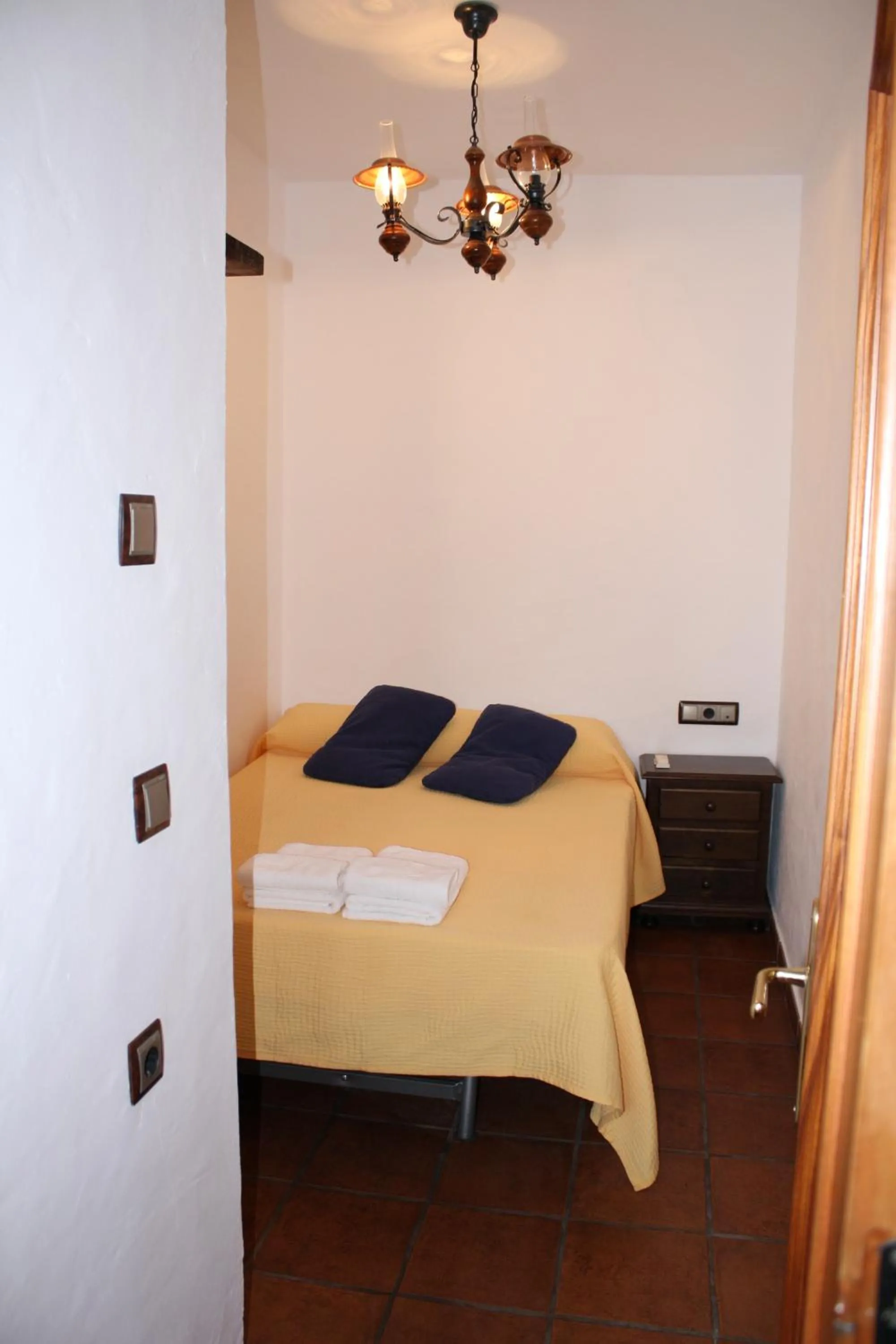 Photo of the whole room, Bed in Hostal Torre de Guzmán