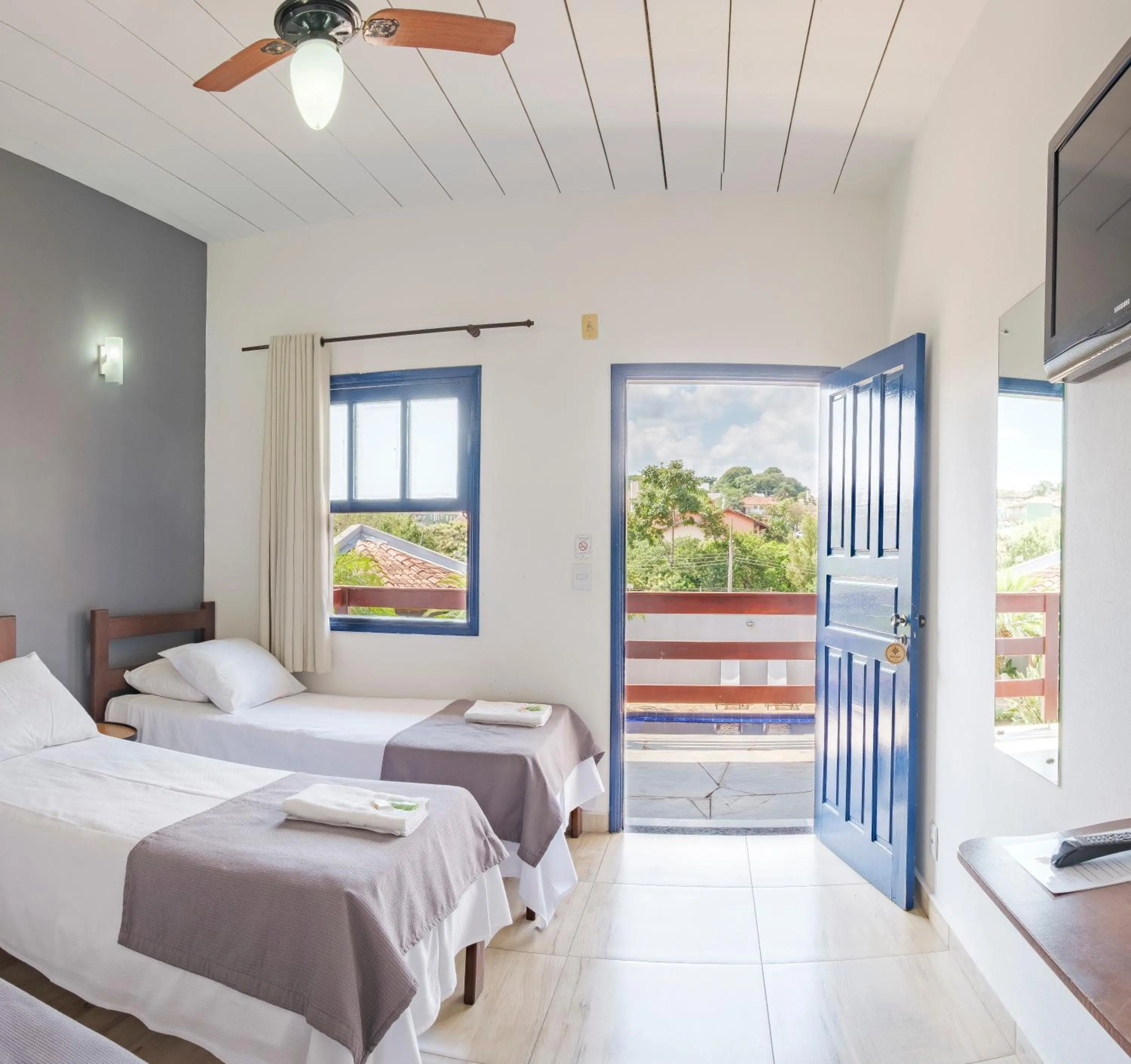 Bed in Pousada Dona Emilia