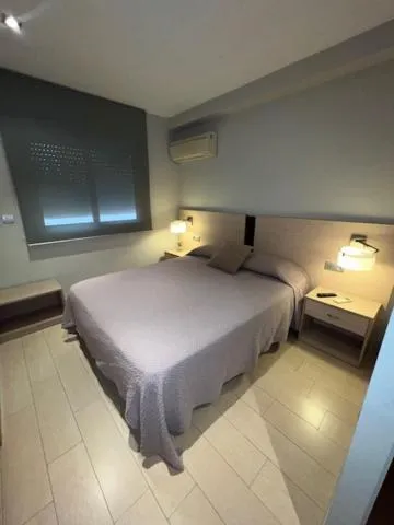 Bed in Hostal Crisami