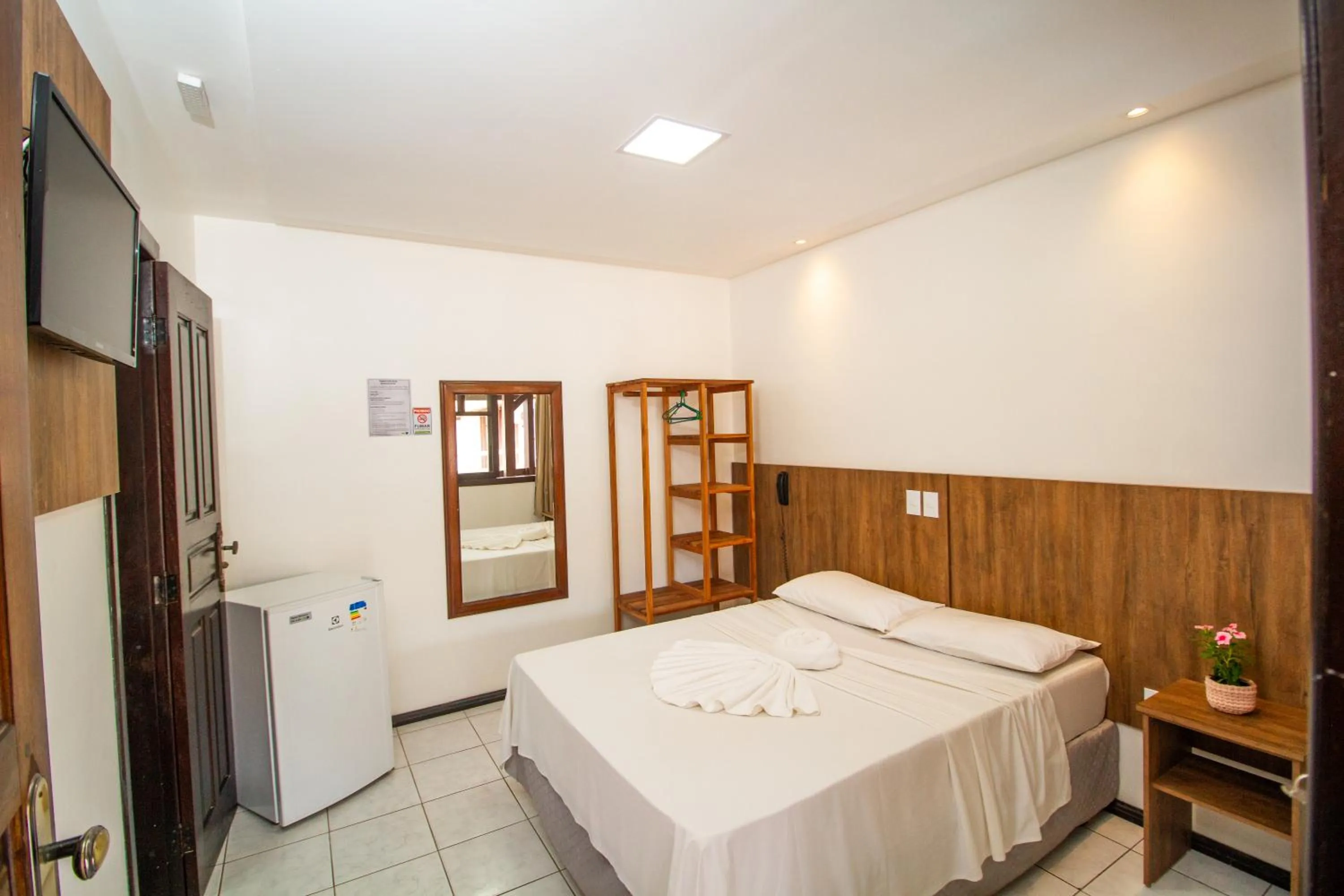 Bed in Hotel Bem Brasil