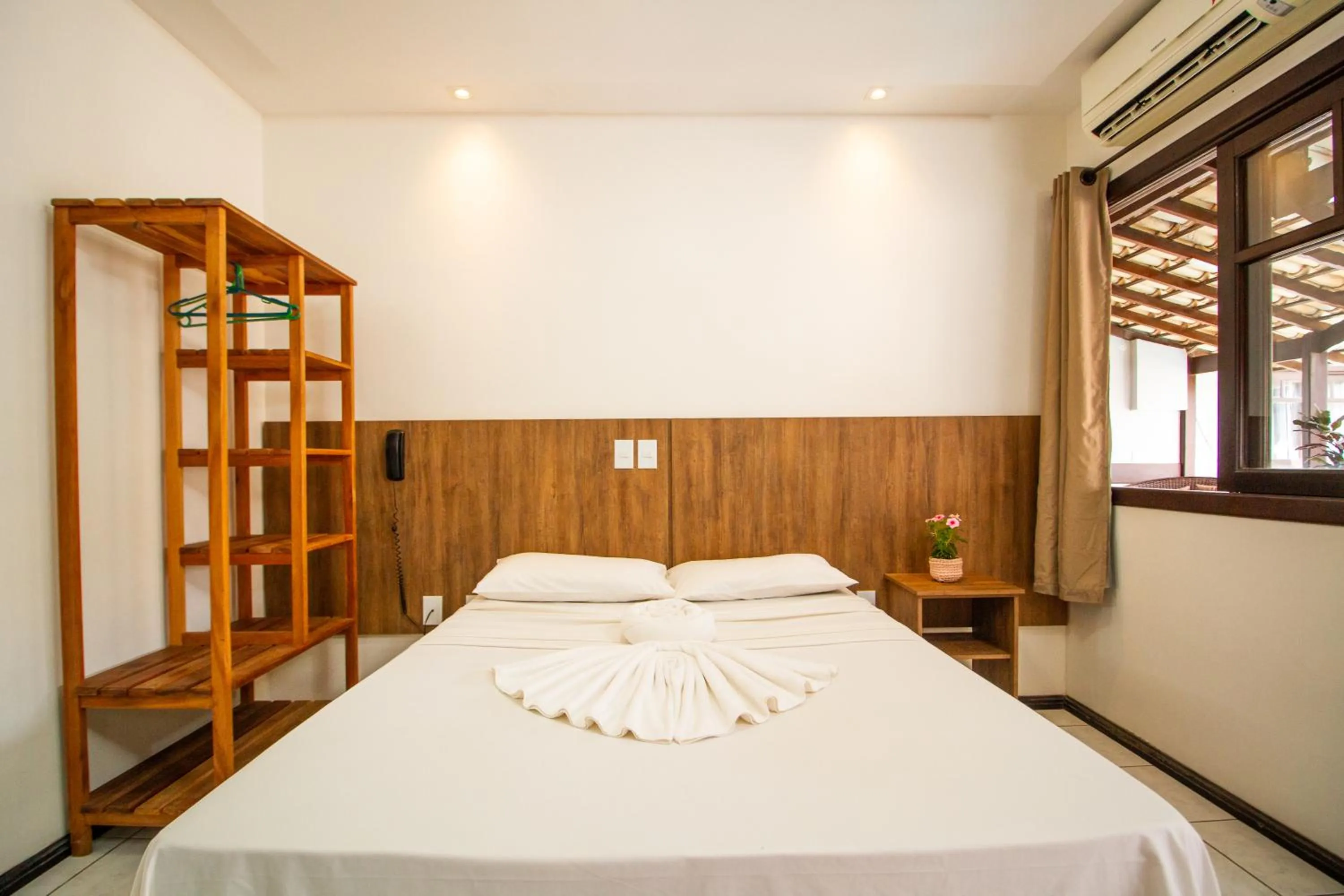 Bed in Hotel Bem Brasil